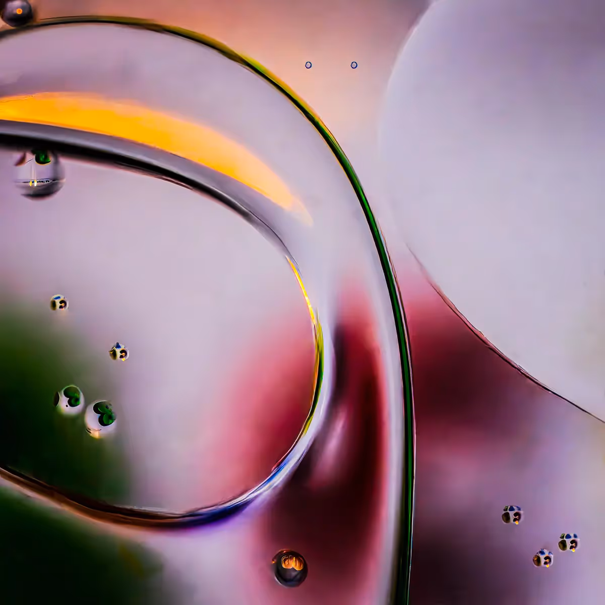 Immiscible: abstract of oil and water with a colorful background. 