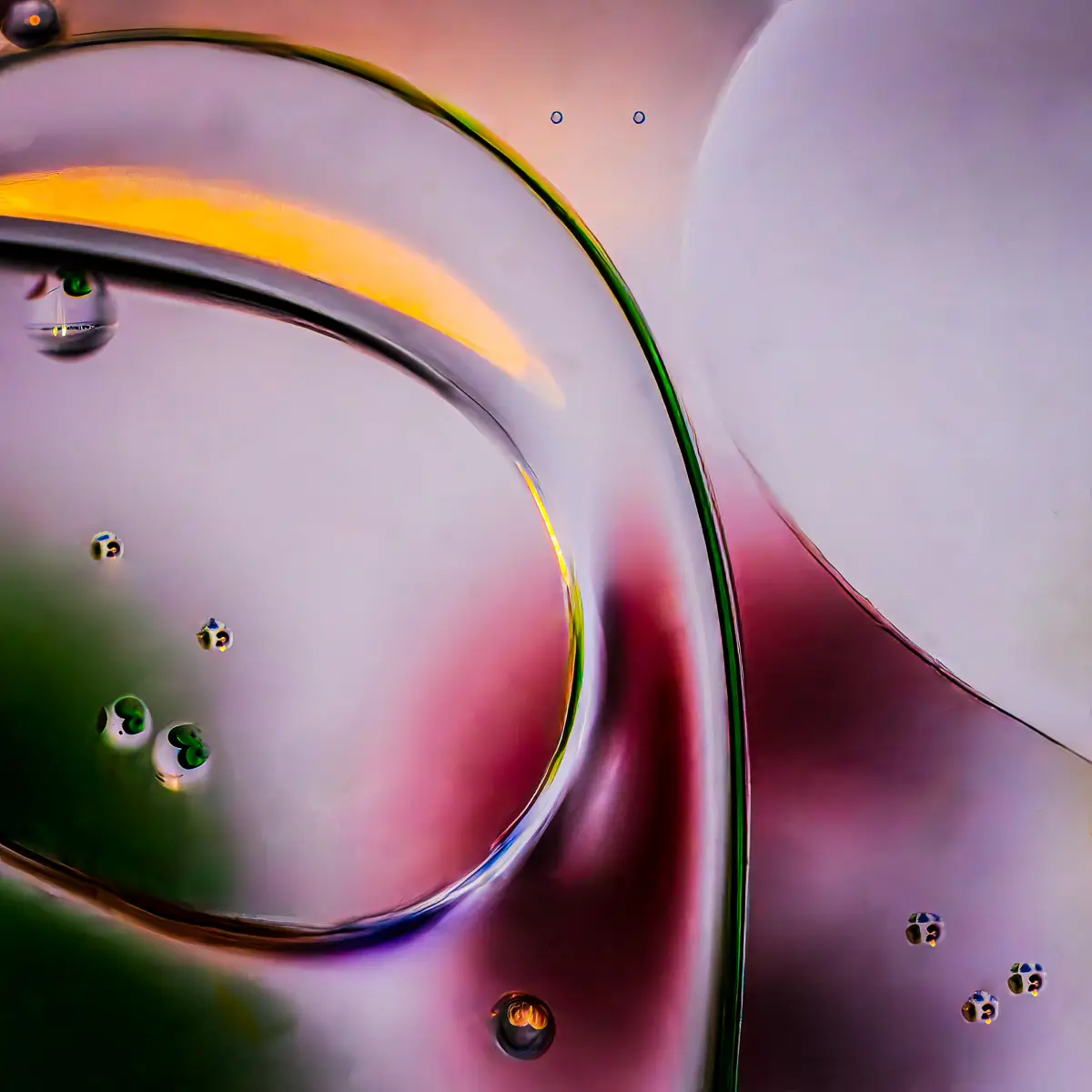 Immiscible: abstract of oil and water with a colorful background. 