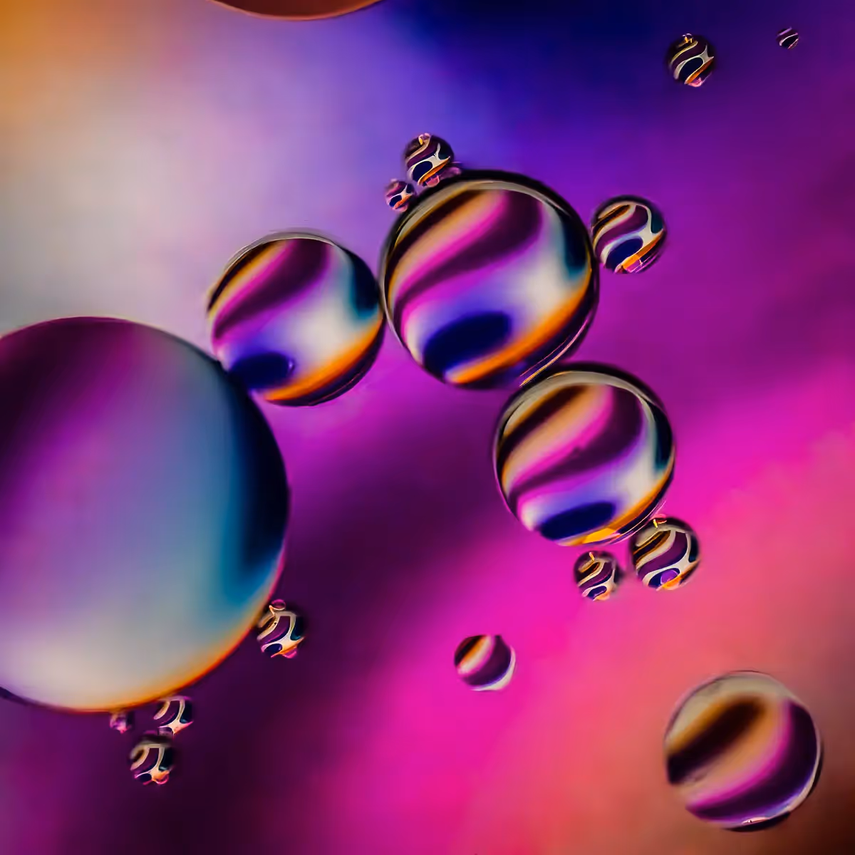 Immiscible: abstract of oil and water with a colorful background. 