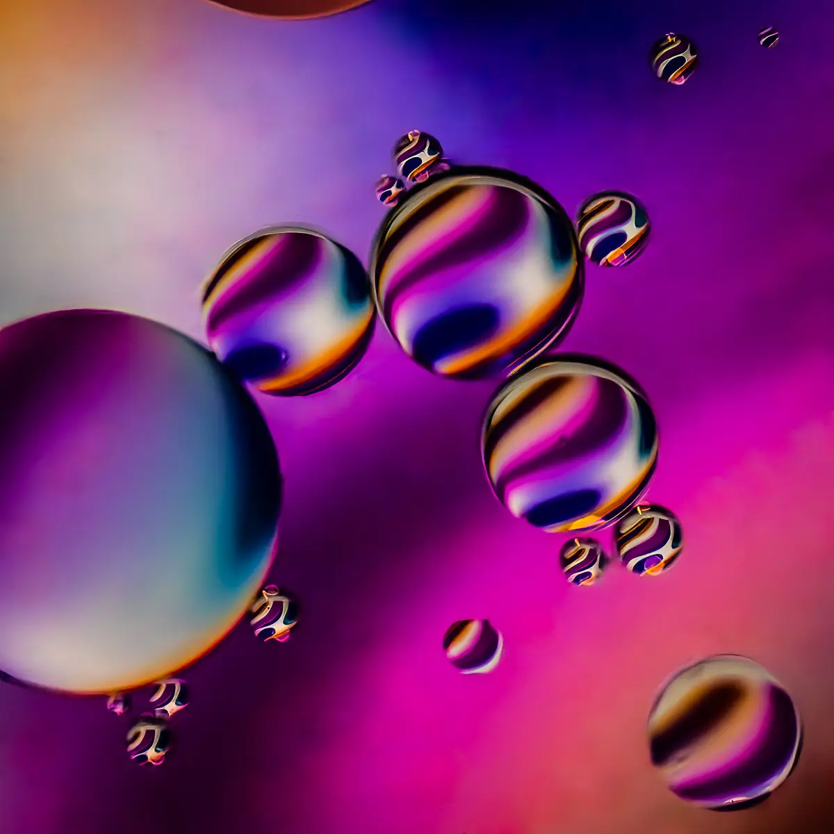 Immiscible: abstract of oil and water with a colorful background. 