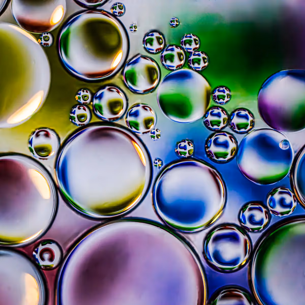 Immiscible: abstract of oil and water with a colorful background. 