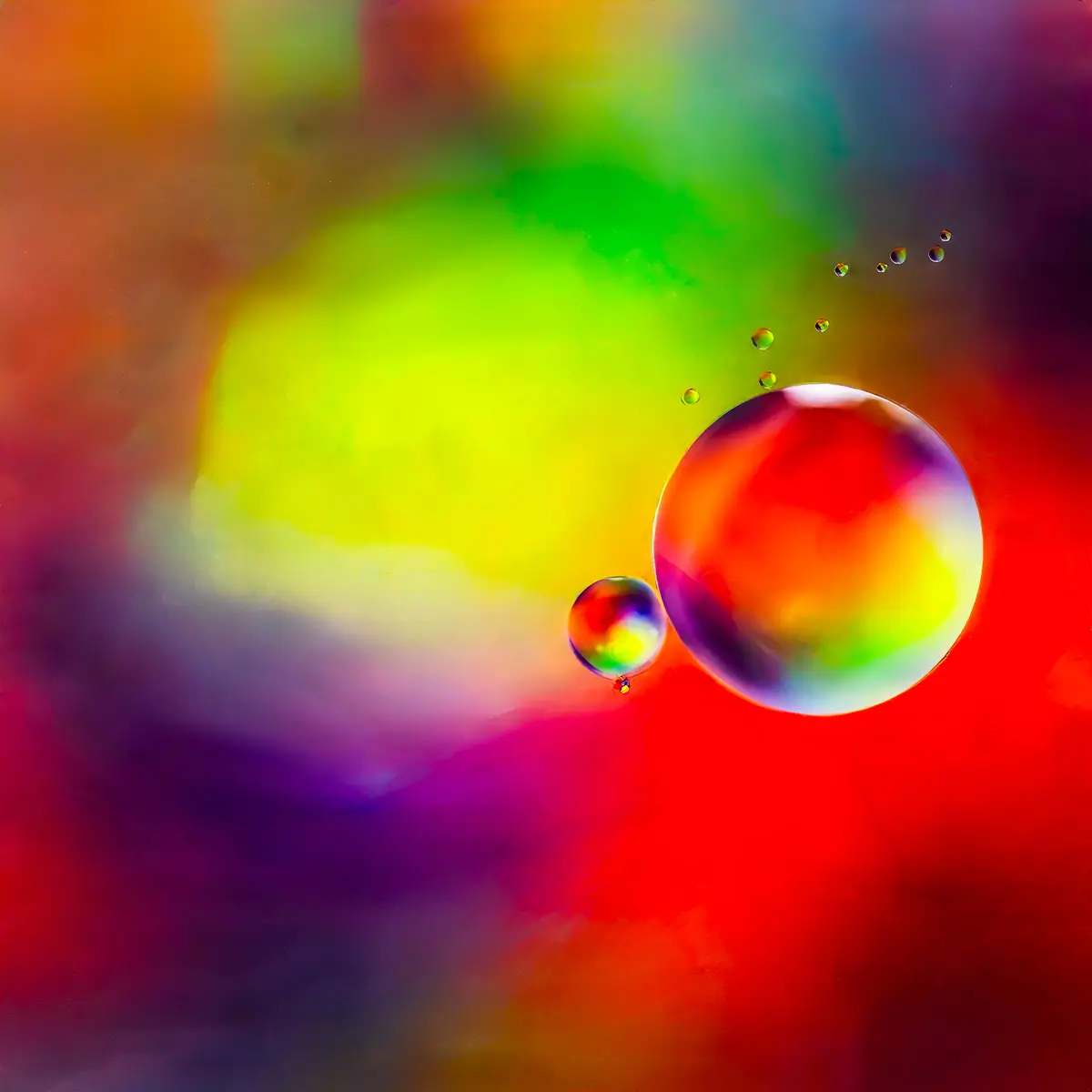 Immiscible: abstract of oil and water with a colorful background. 