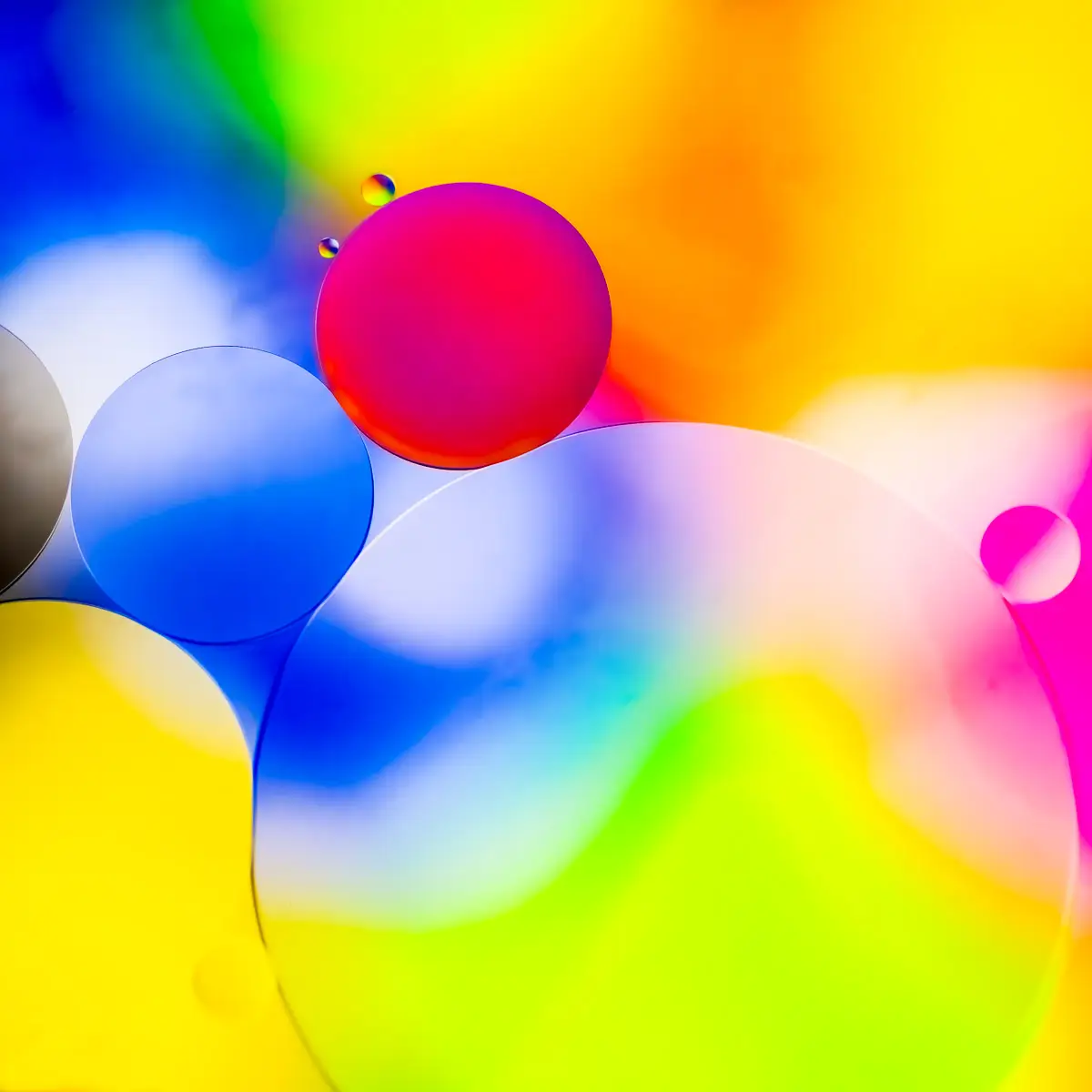 Immiscible: abstract of oil and water with a colorful background. 