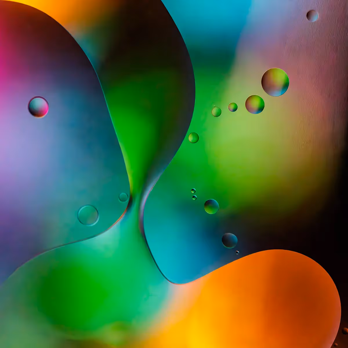 Immiscible: abstract of oil and water with a colorful background. 