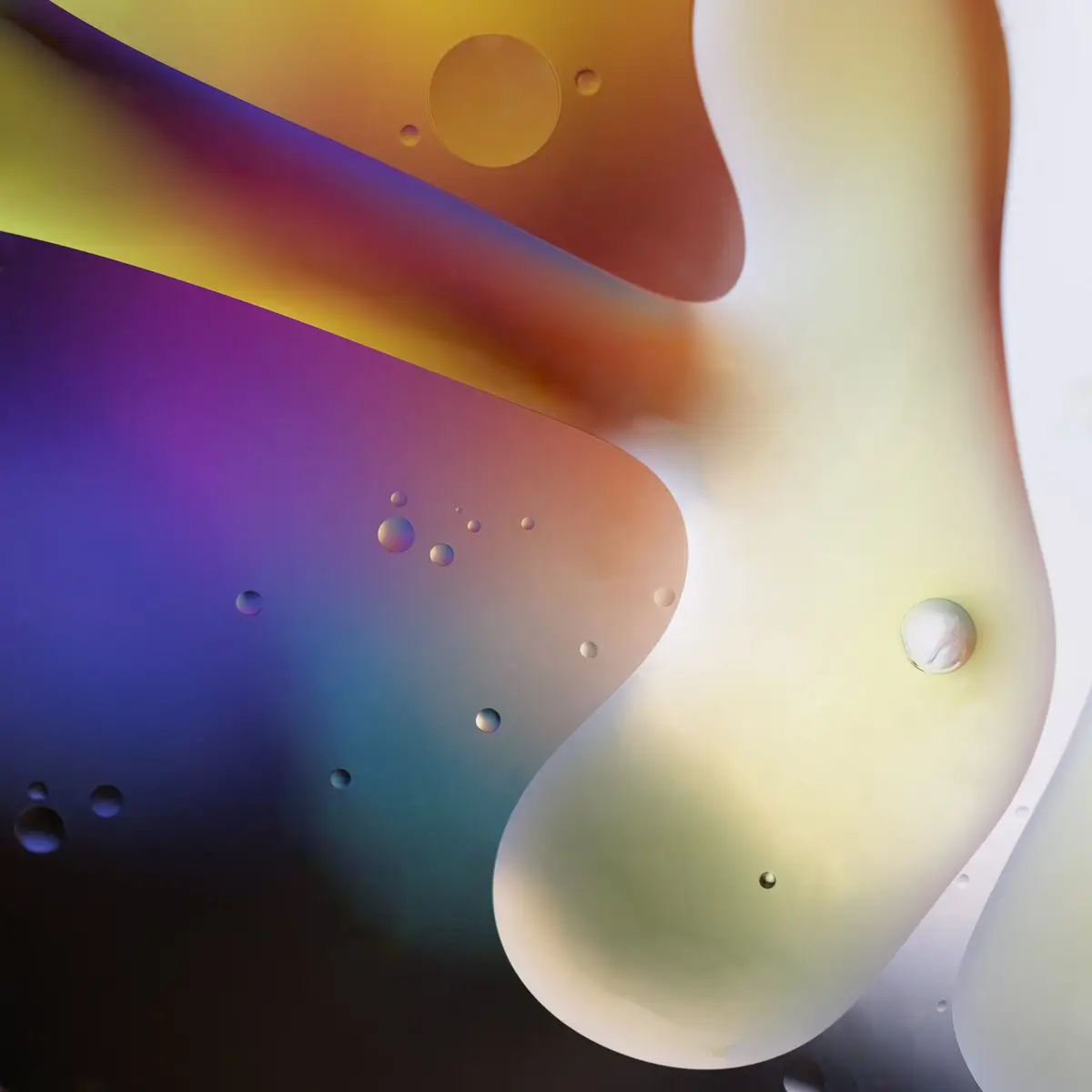 Immiscible: abstract of oil and water with a colorful background. 