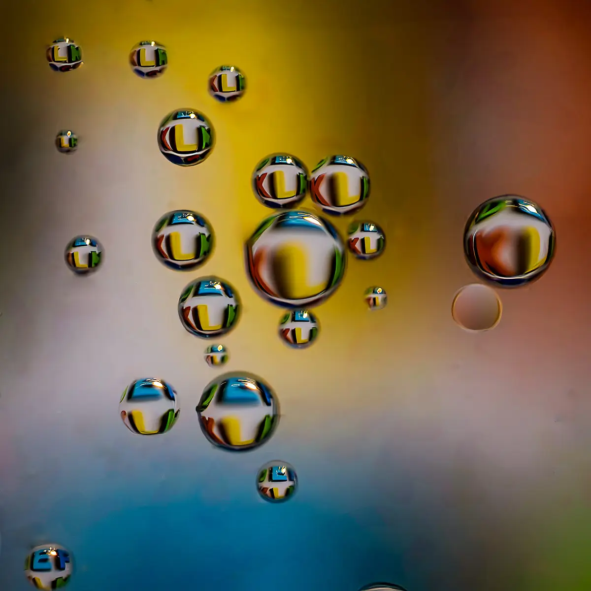Immiscible: abstract of oil and water with a colorful background. 