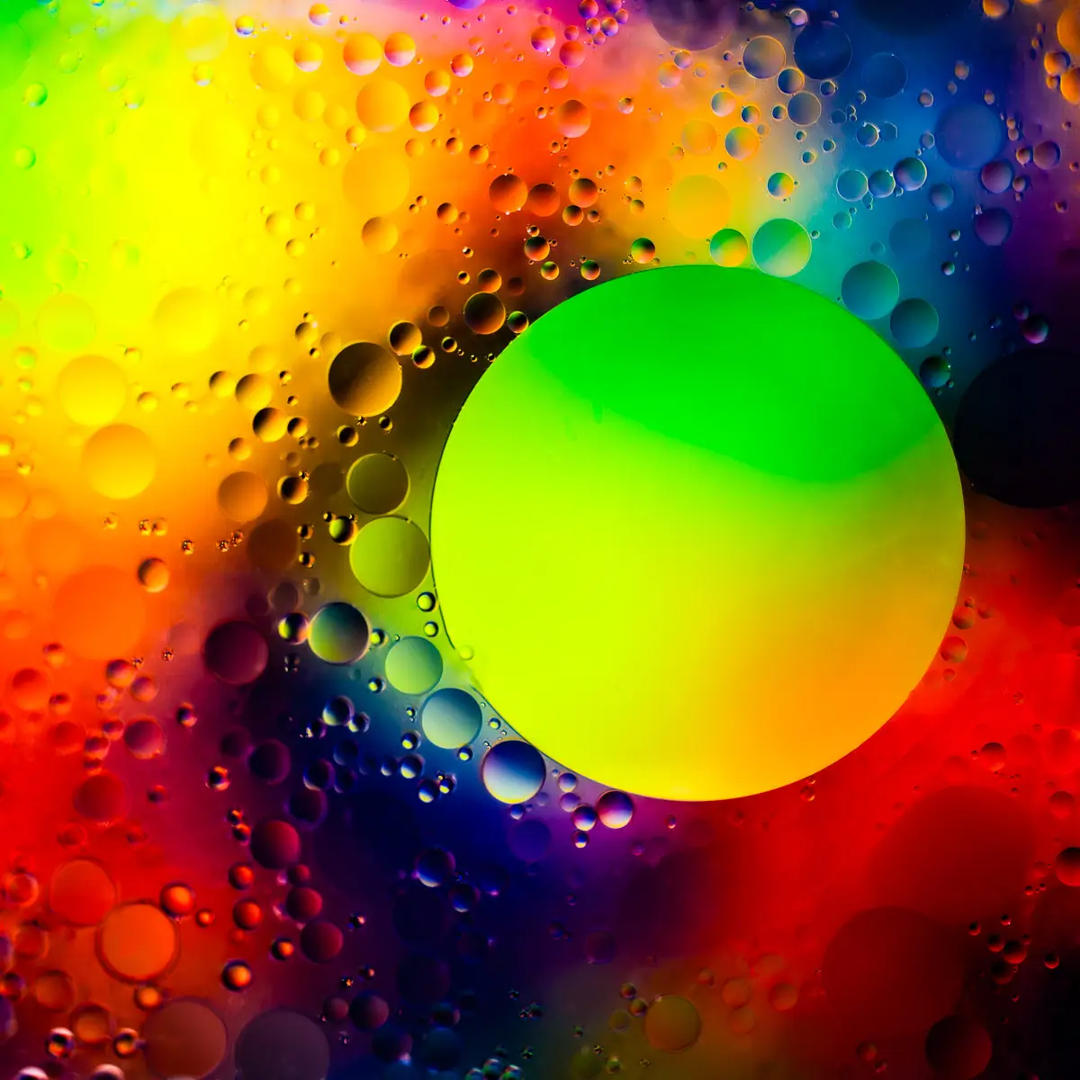 Immiscible: abstract of oil and water with a colorful background. 