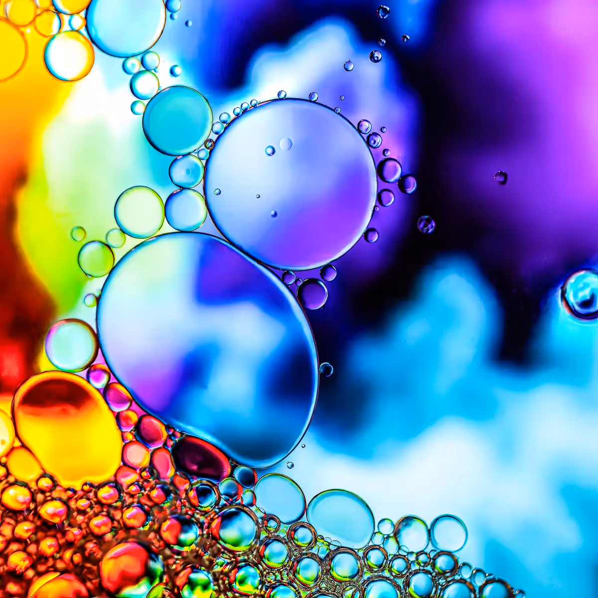 Immiscible: abstract of oil and water with a colorful background. 
