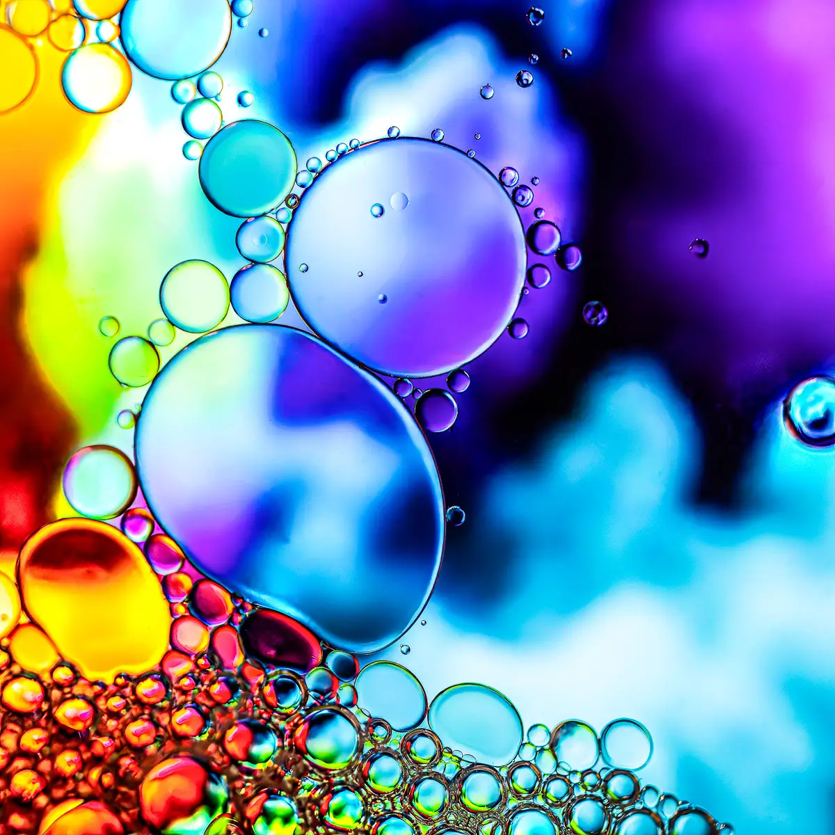 Immiscible: abstract of oil and water with a colorful background. 