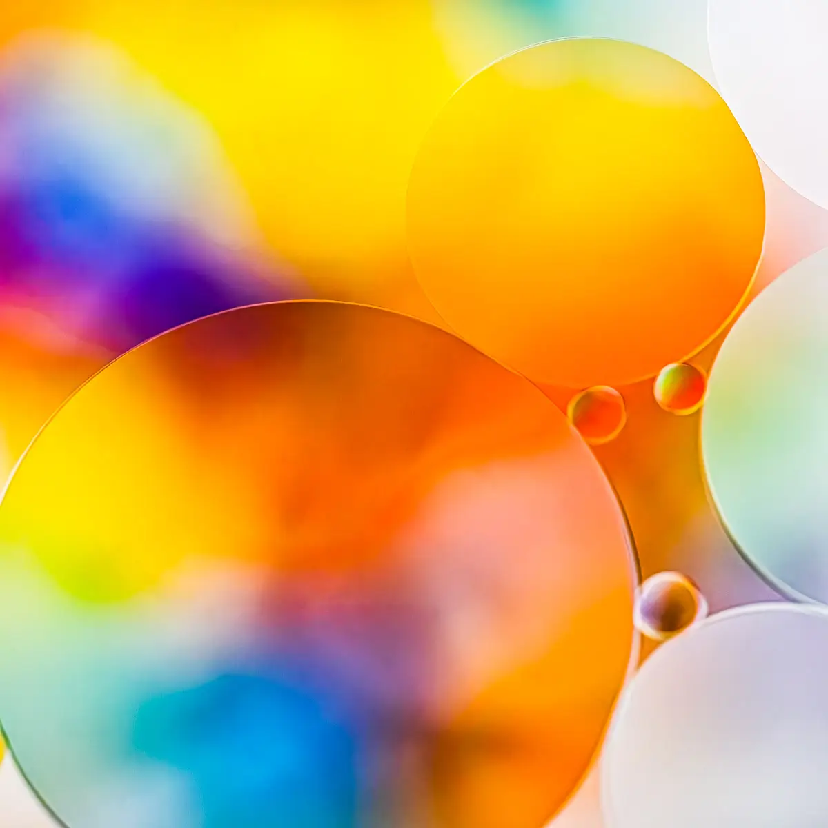 Immiscible: abstract of oil and water with a colorful background. 