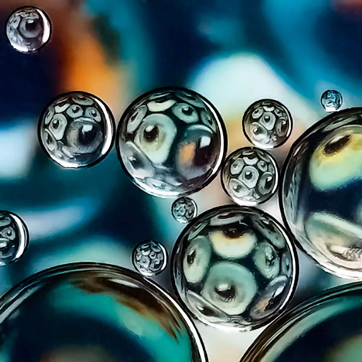 Immiscible: abstract of oil and water with a colorful background.  eyeballs