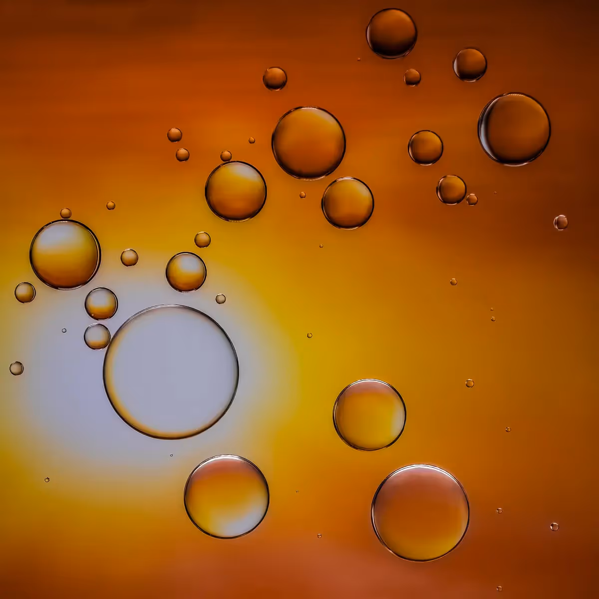 Immiscible: abstract of oil and water with a colorful background. 
