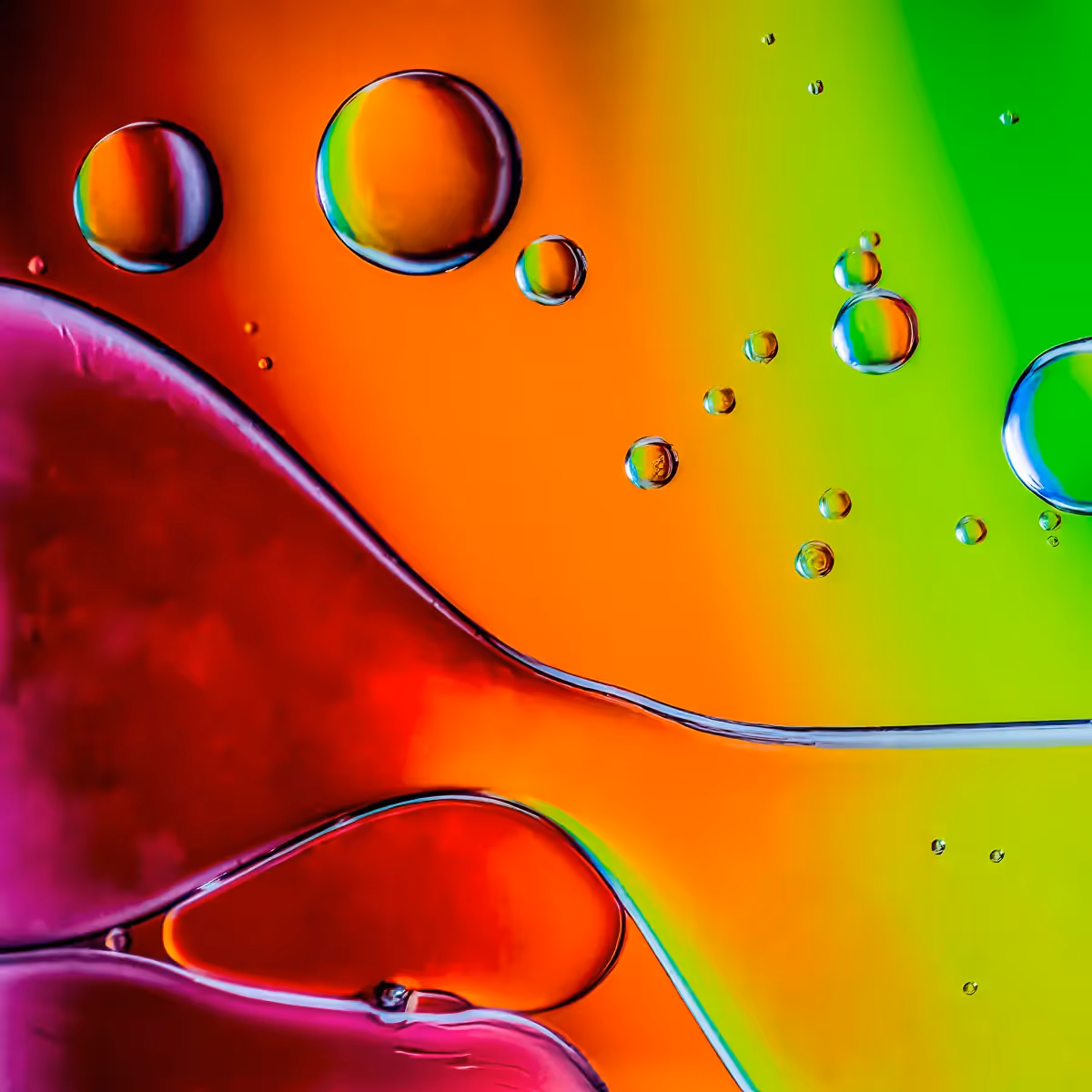 Immiscible: abstract of oil and water with a colorful background. 