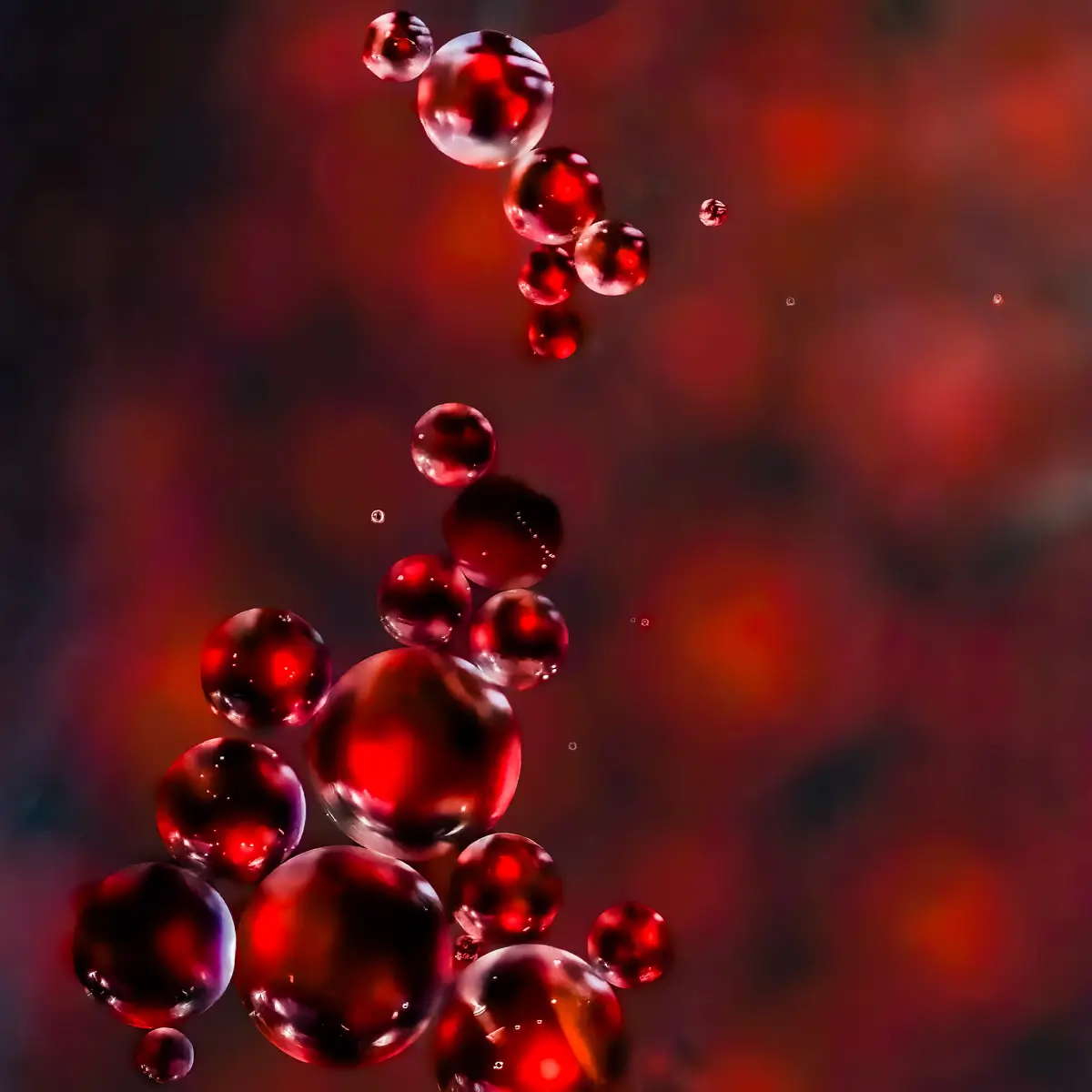 Immiscible: abstract of oil and water with a colorful background.  Black and red