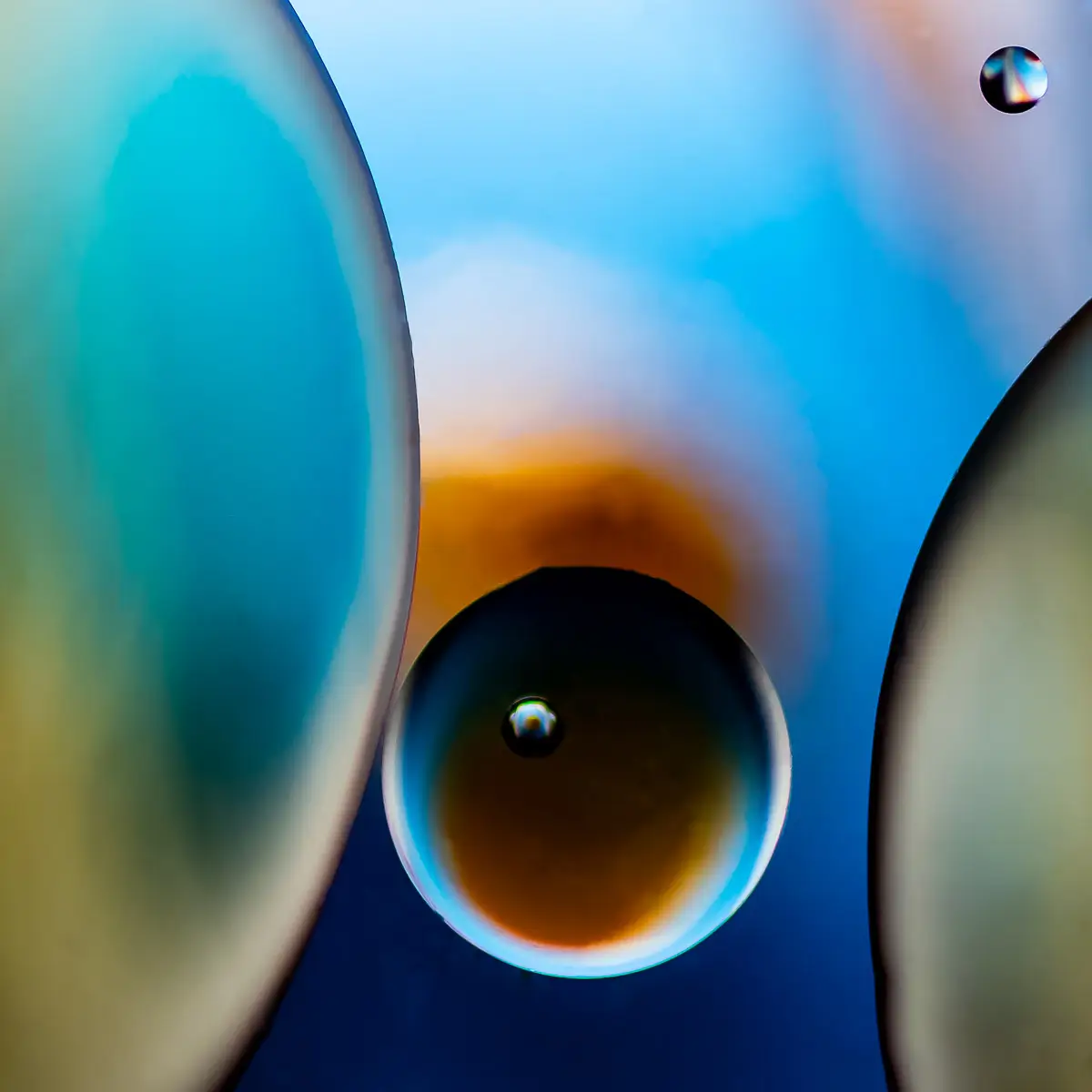 Immiscible: abstract of oil and water with a colorful background. 