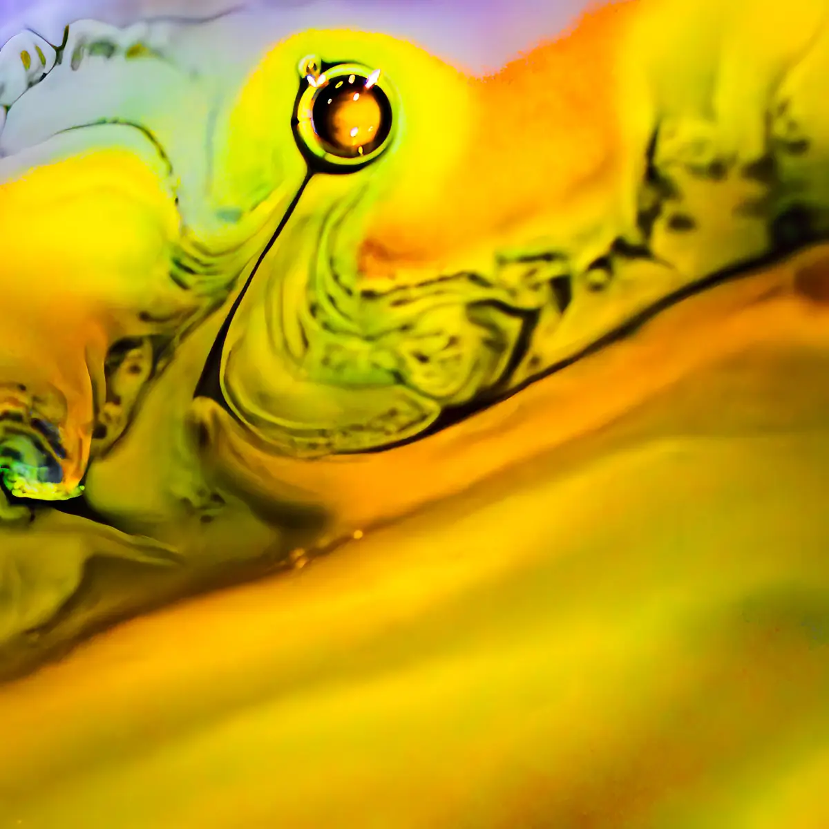 Milk and food coloring abstract with yellow and green