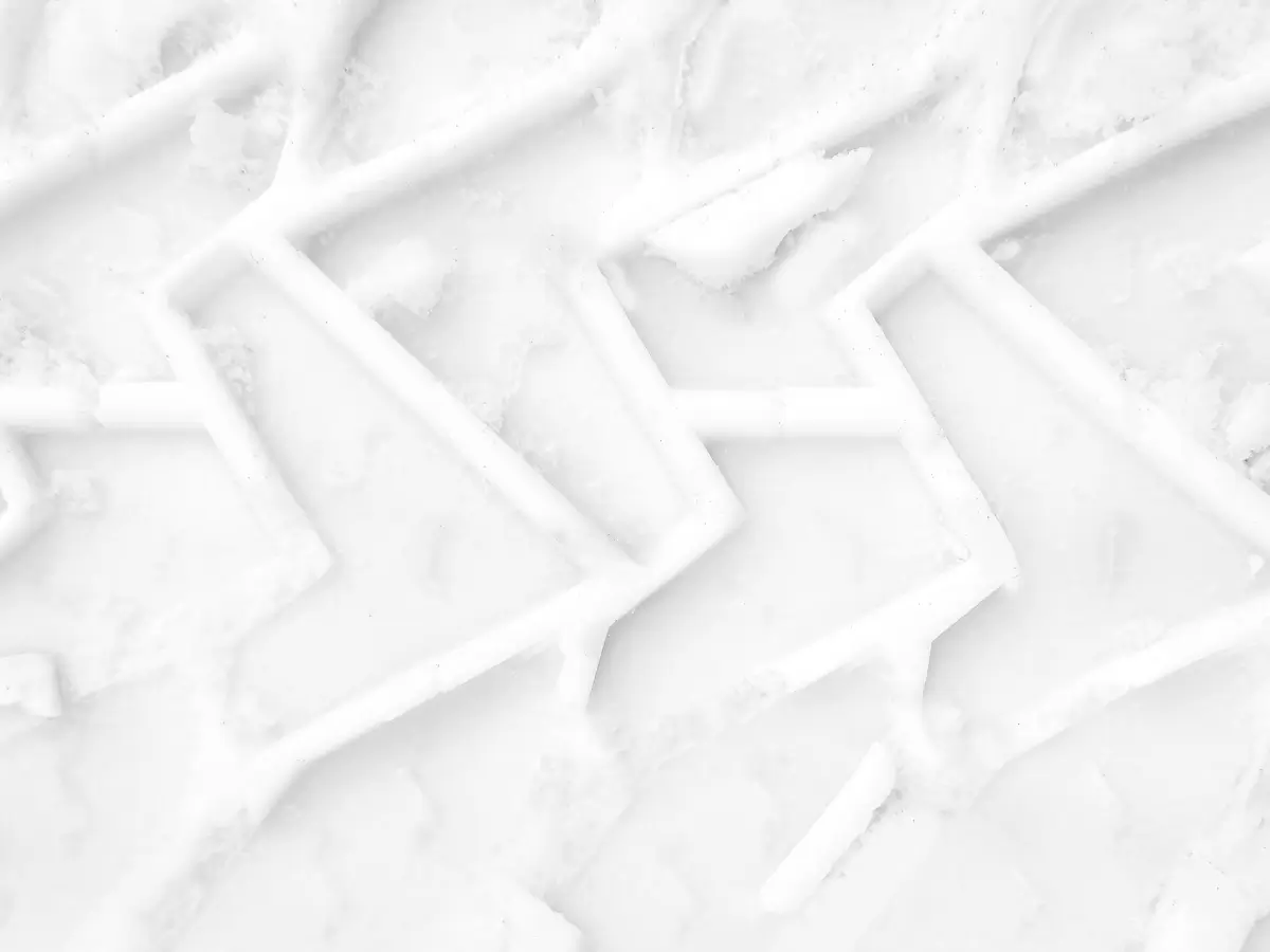abstact pattern of tire marks in the snow