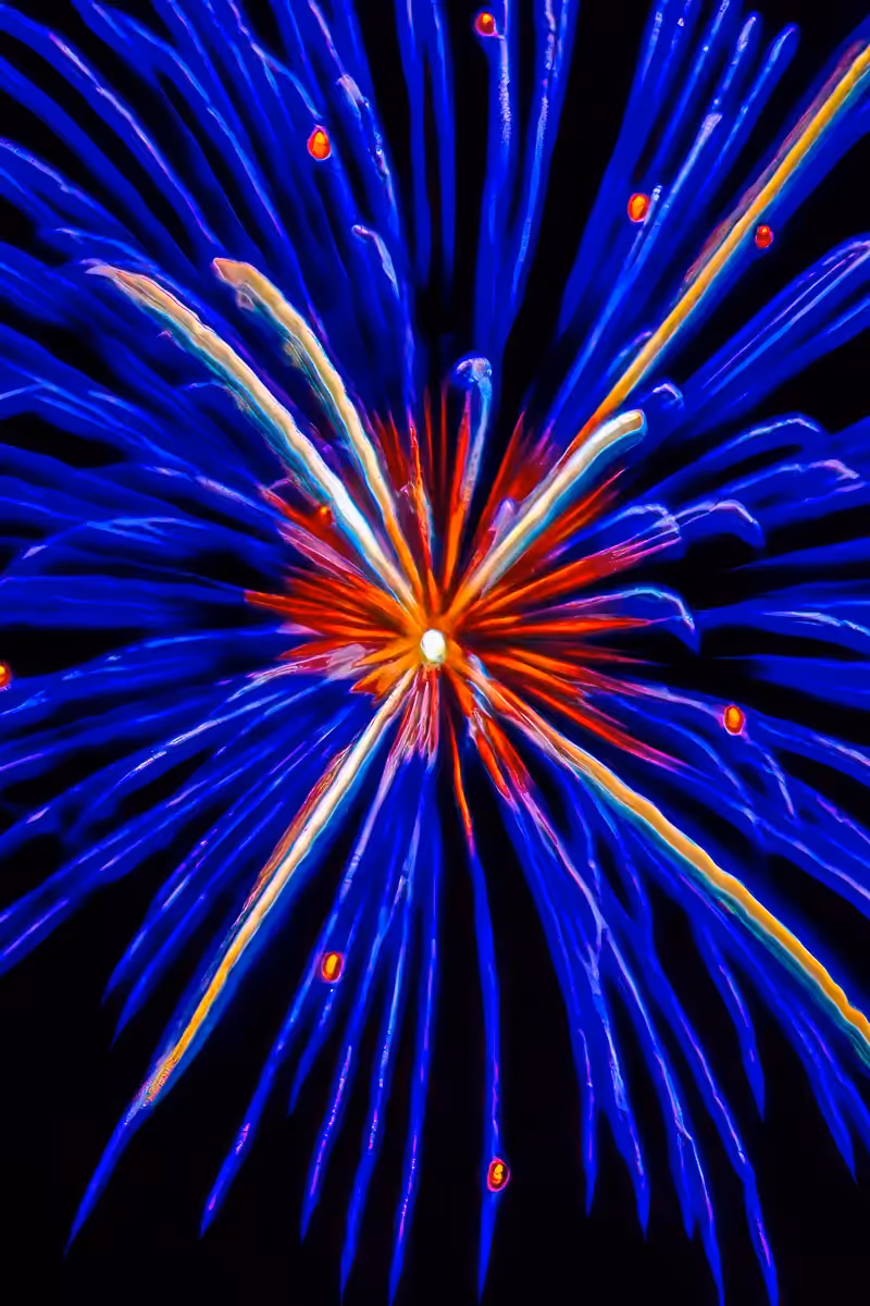 Abstract fireworks: dramatic blue burst