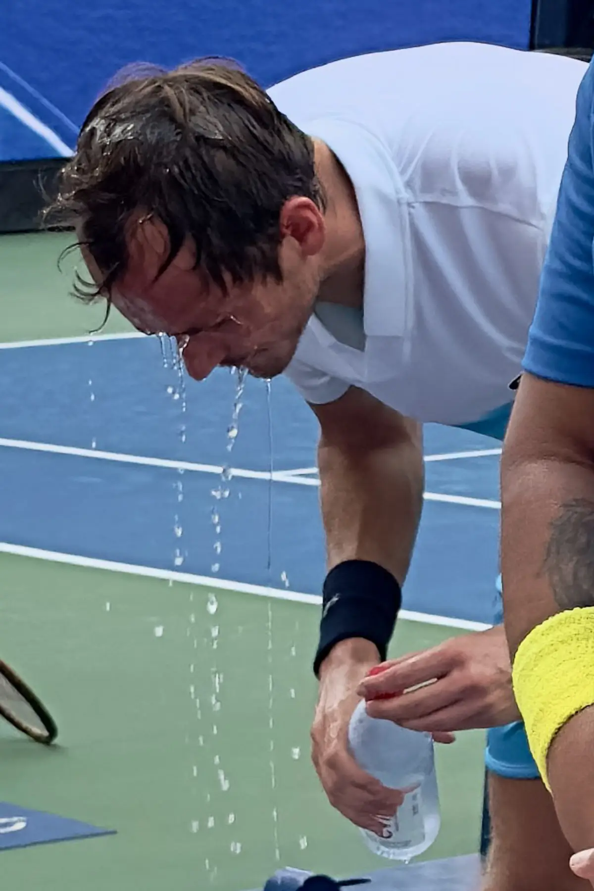 US Open tennis, Flushing NY: Medvedev dripping water after splashing face