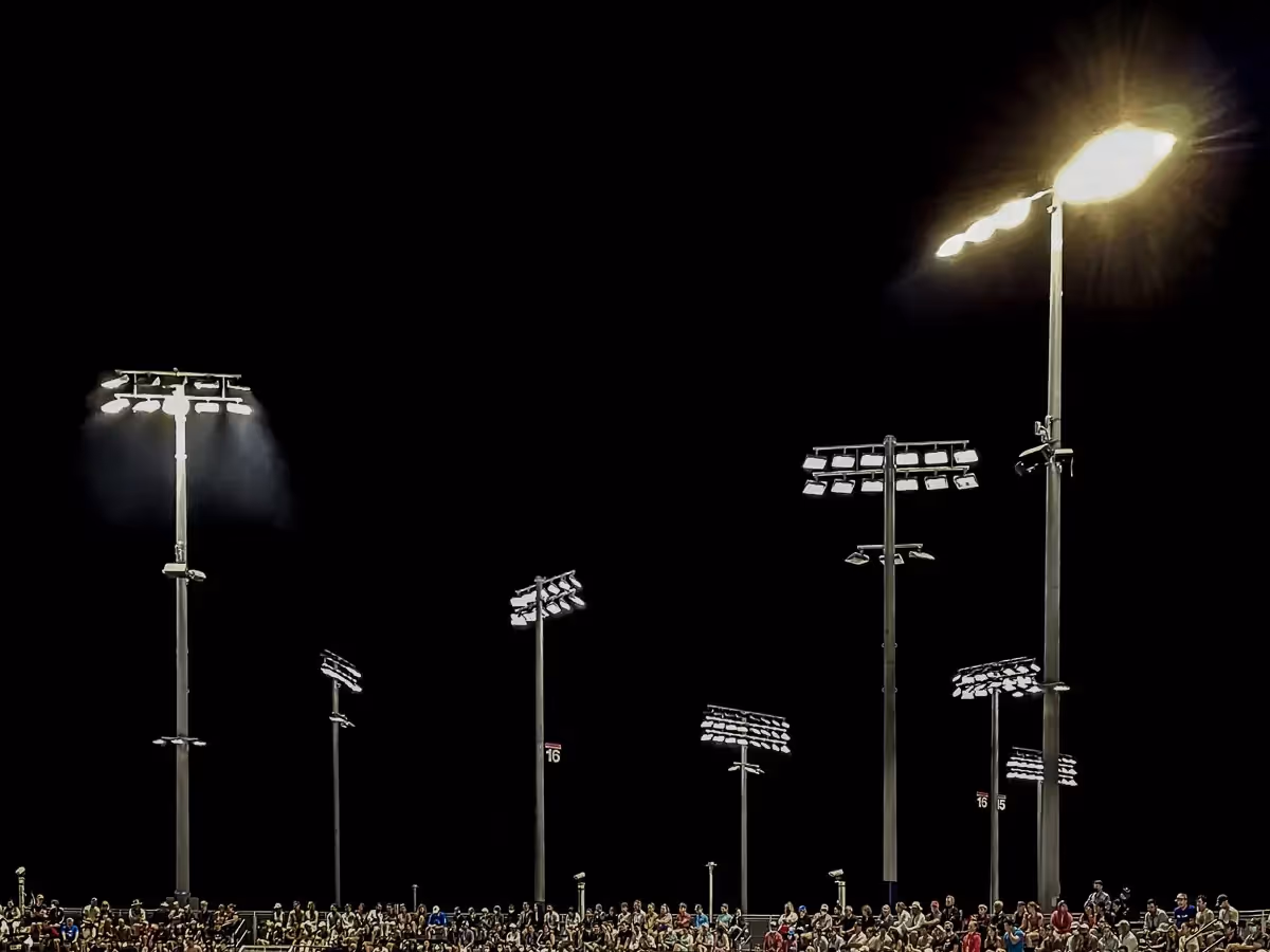 Bright lights lighting up the US Open tennis courts are scattered in an interesting pattern.
