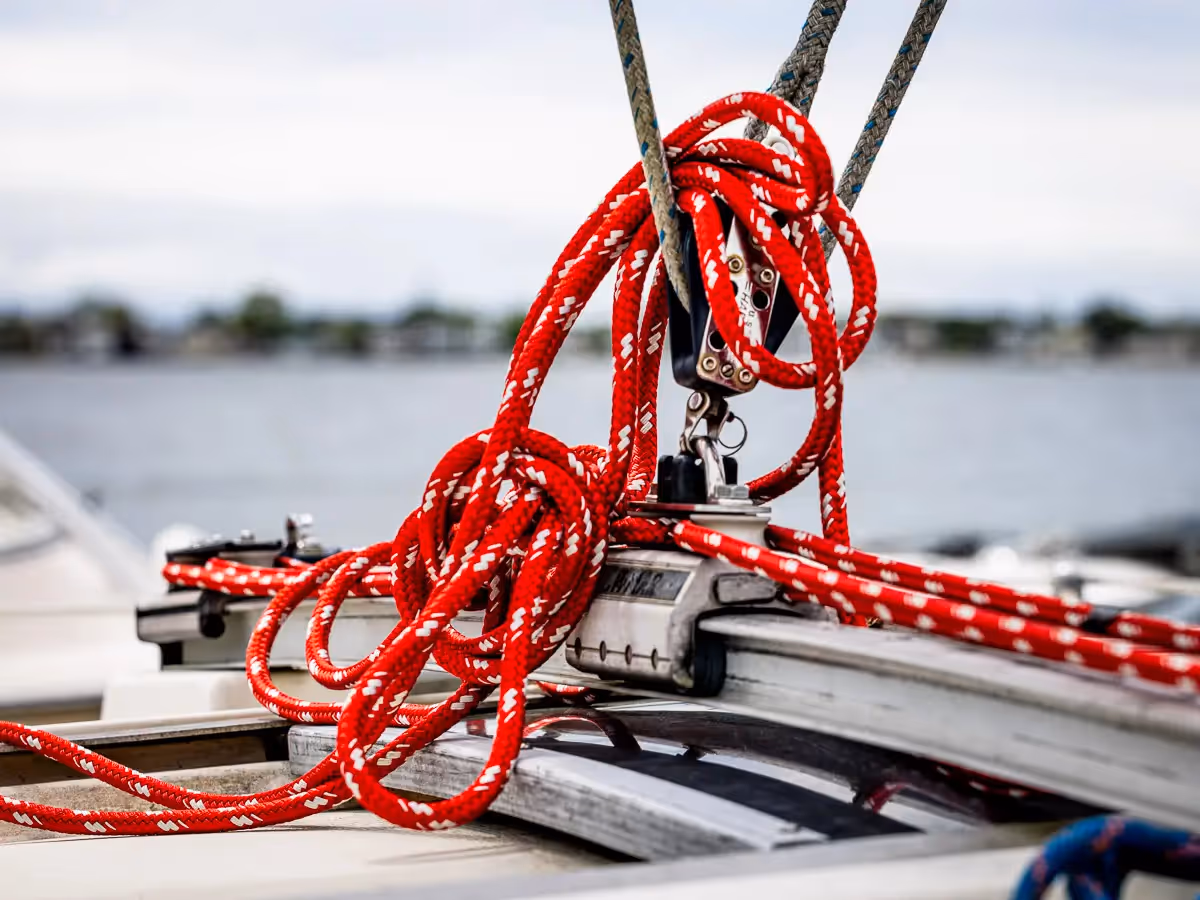 Red rope tangled and onboard a boat