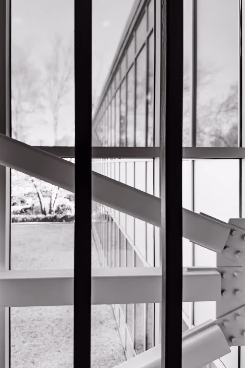 black and white: shapes and lines looking out of a window onto multiple other windows