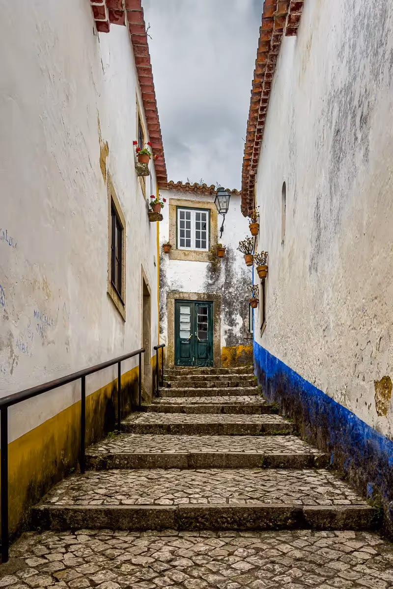 Portugal: long path up gradual stairs, getting narrow