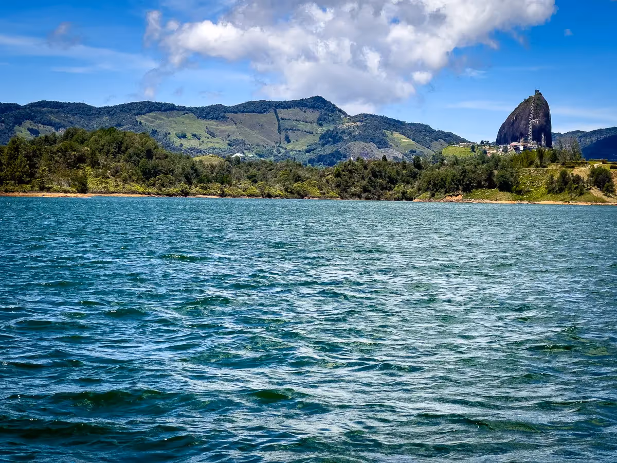 View of El Penon de Guatape from across the sea