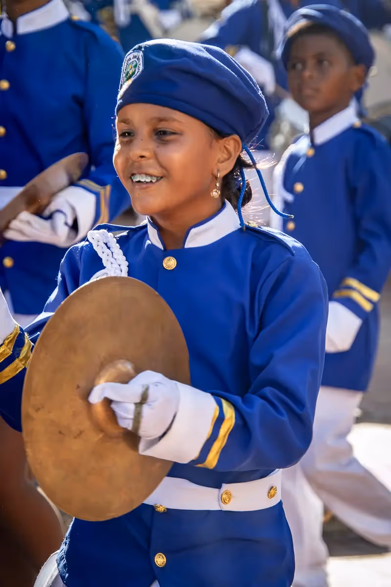 Colombia Independence Day Parade: girl playing the Tamborine