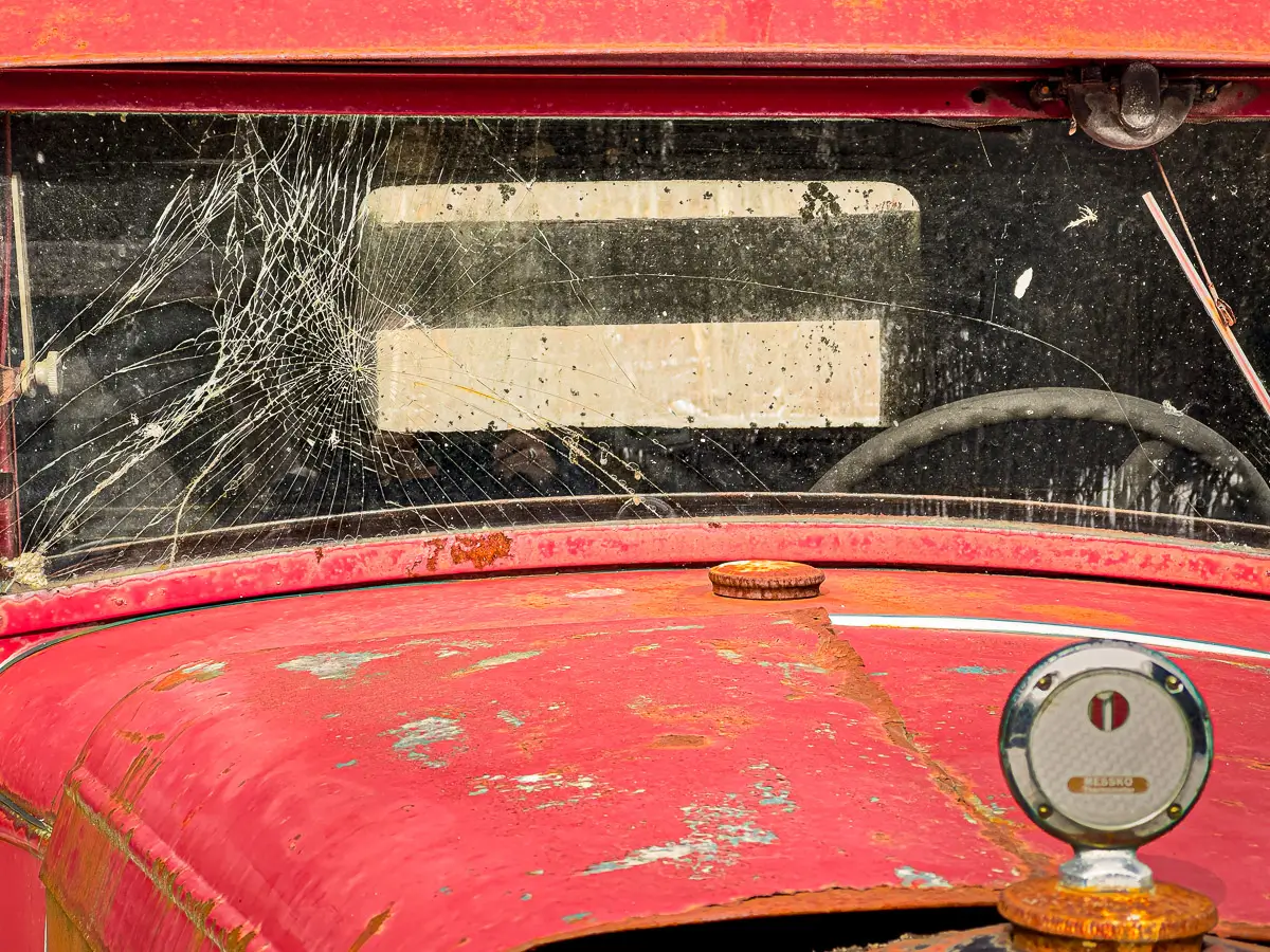 old rusted jeep windshield