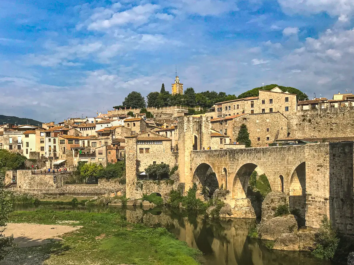 Girona Spain: view of thePont Vell de Besalú, an iconic 12th-century Romanesque bridge that leads to the historic stoned town