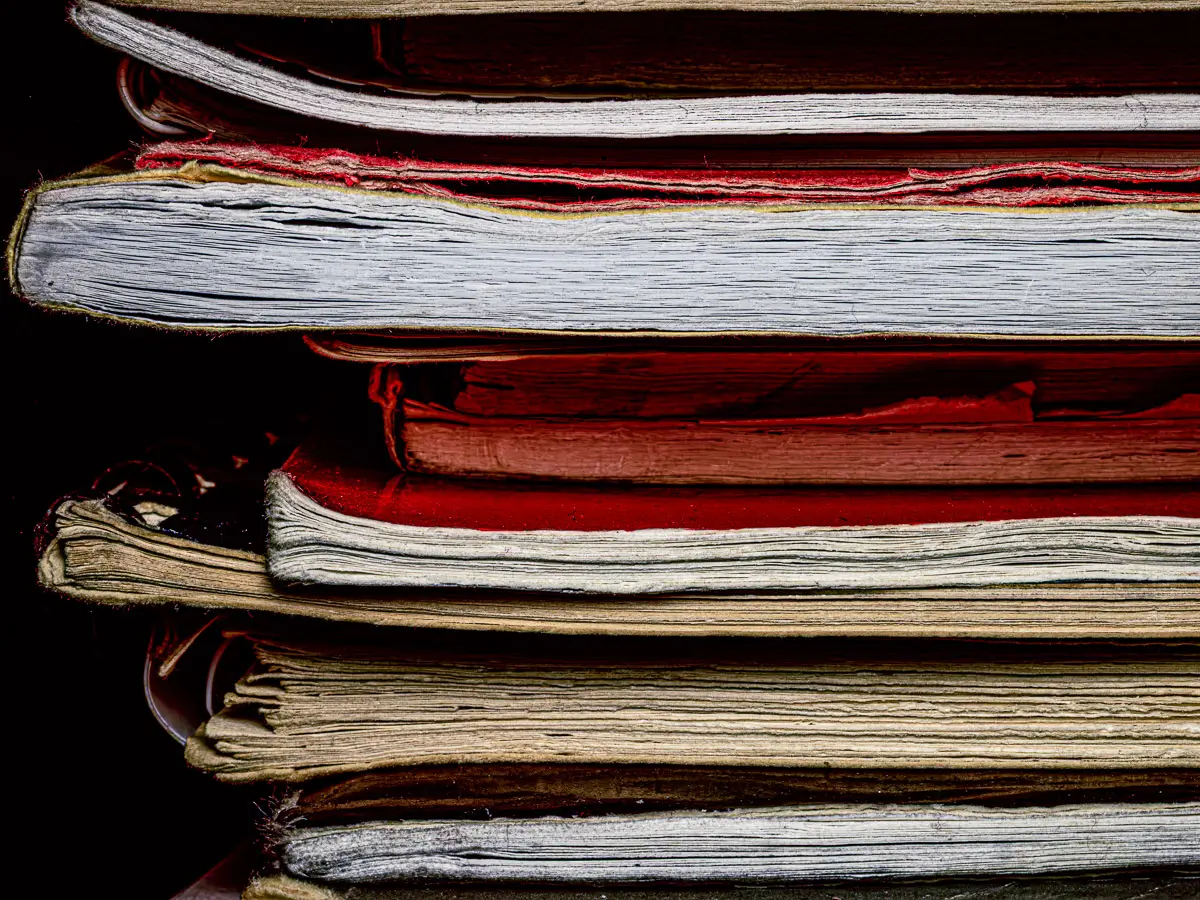 close up shot of stacked books on their side