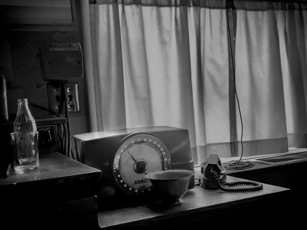 Black and white shot inside Normal Rockwell's studio showing some old artifacts