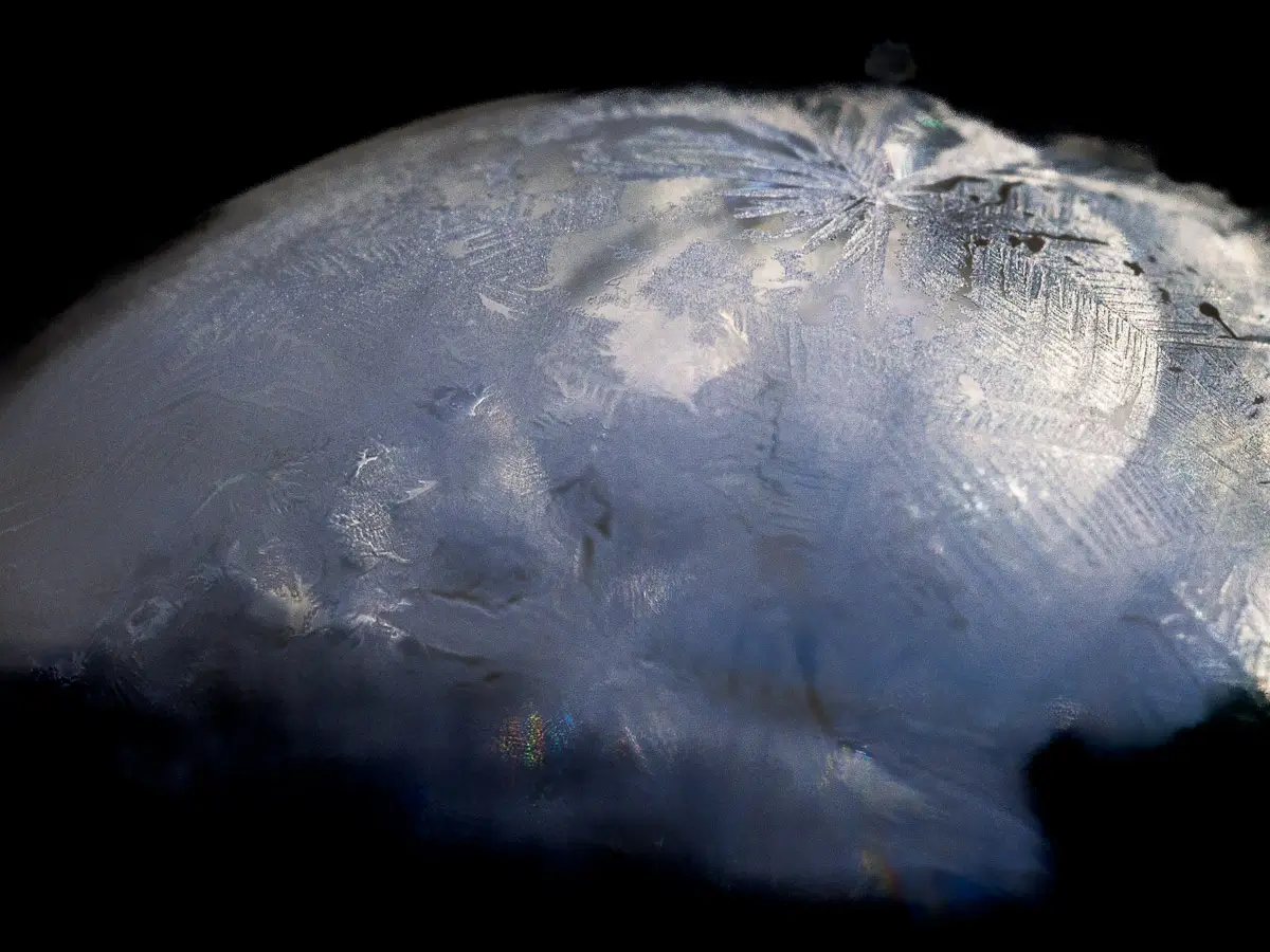 frozen soap bubble with revealing snowflake pattern on top