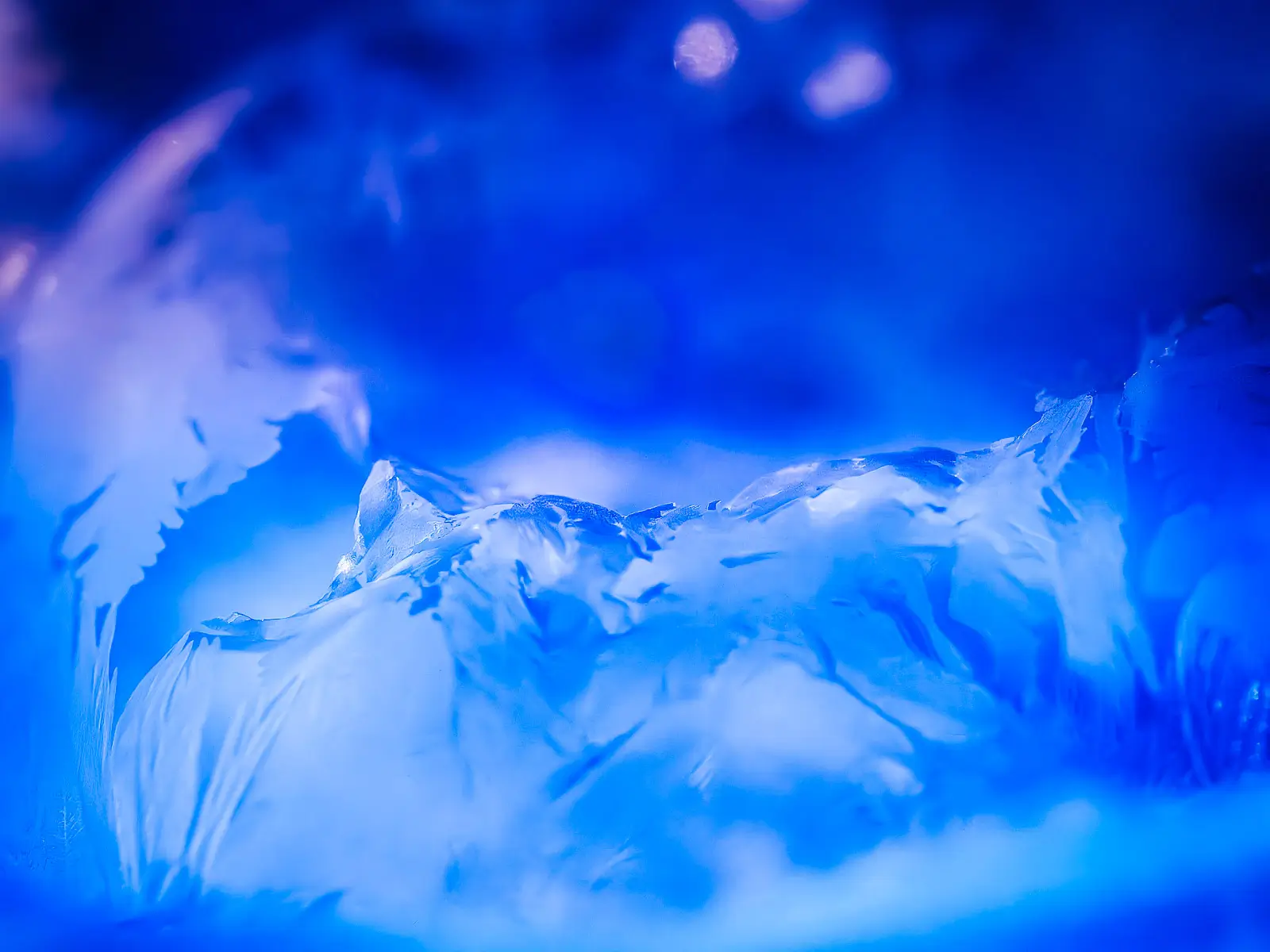 bursted, frozen soap bubble, looks like an snowy landscape