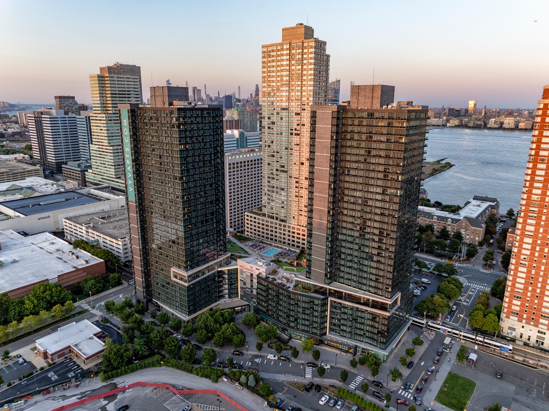 Aerial view of high-rise residential towers along the waterfront