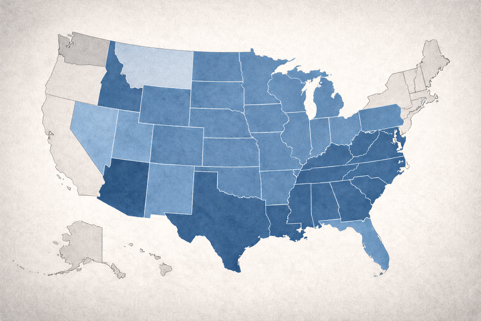 Two women looking at and discussing content on a tablet while a man writes in the foreground.