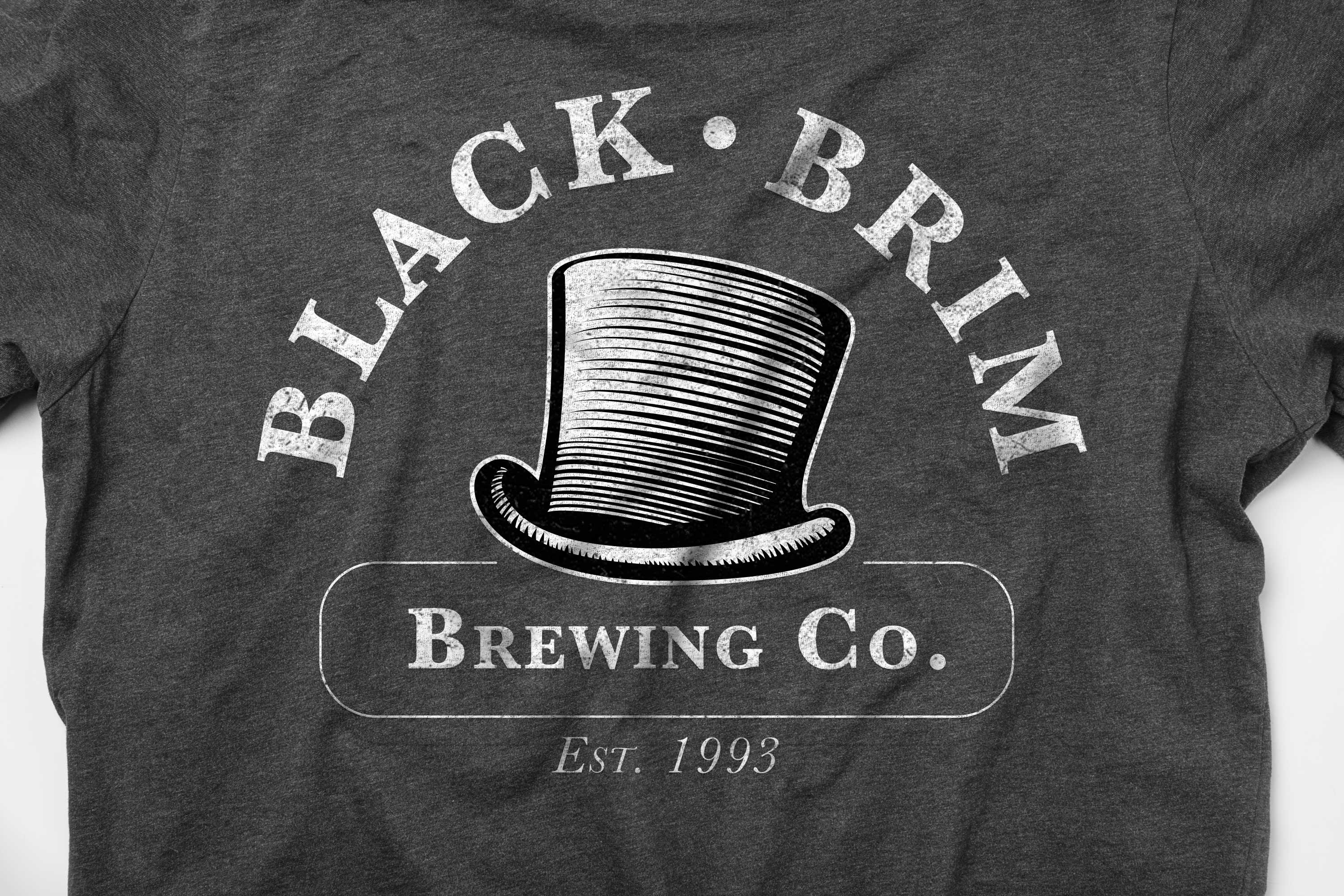 Gray shirt with white vintage top hat and text Black Brim Brewing Co. Est. 1993 printed on it.
