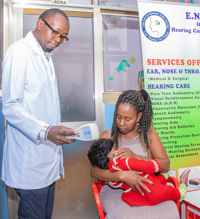 An audiologist performing the ditraction test