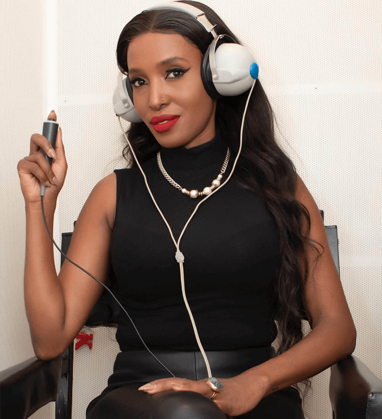 A lady illustrating the Pure Tone Audiometry (PTA) Test