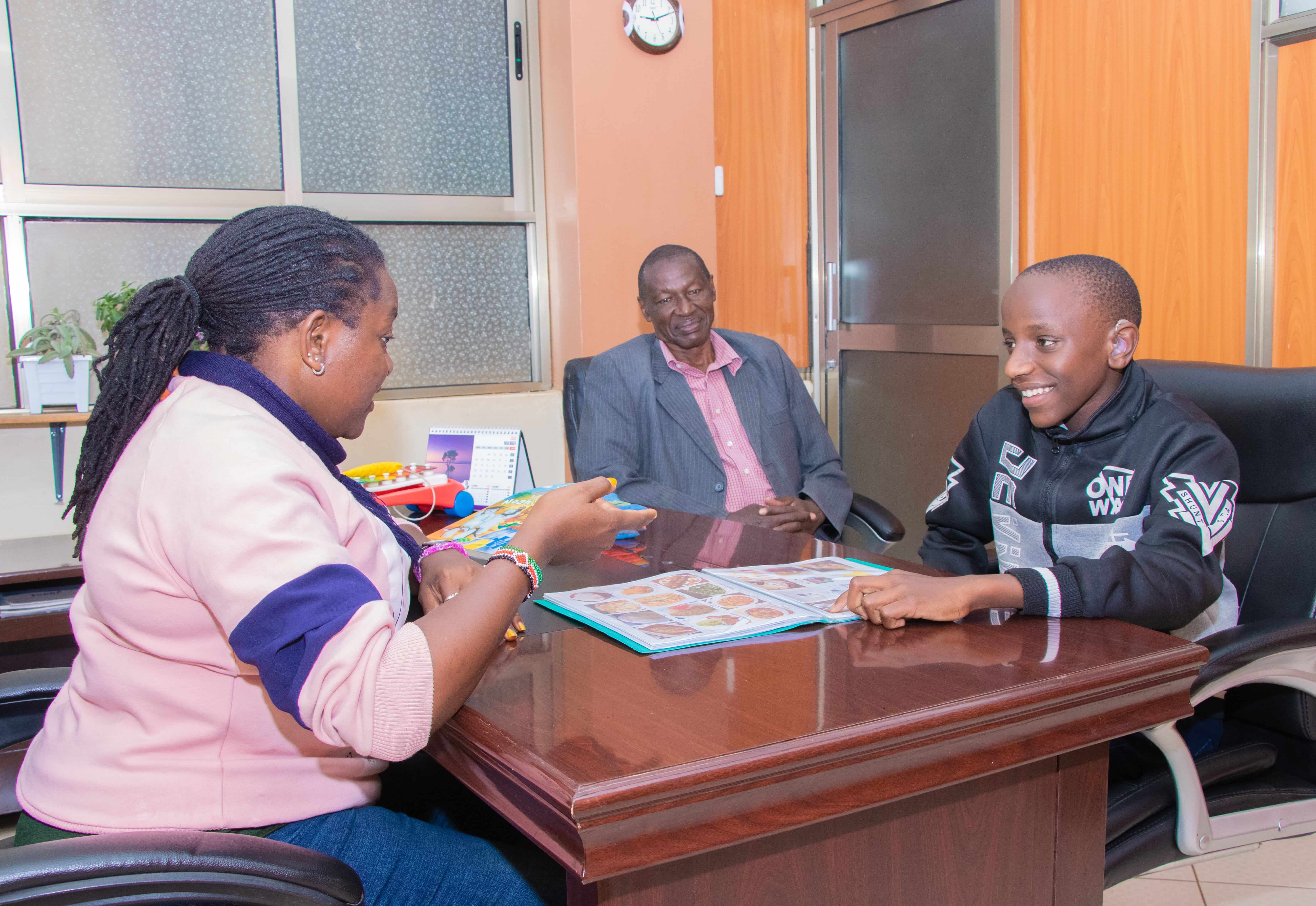 A child receiving speech therapy