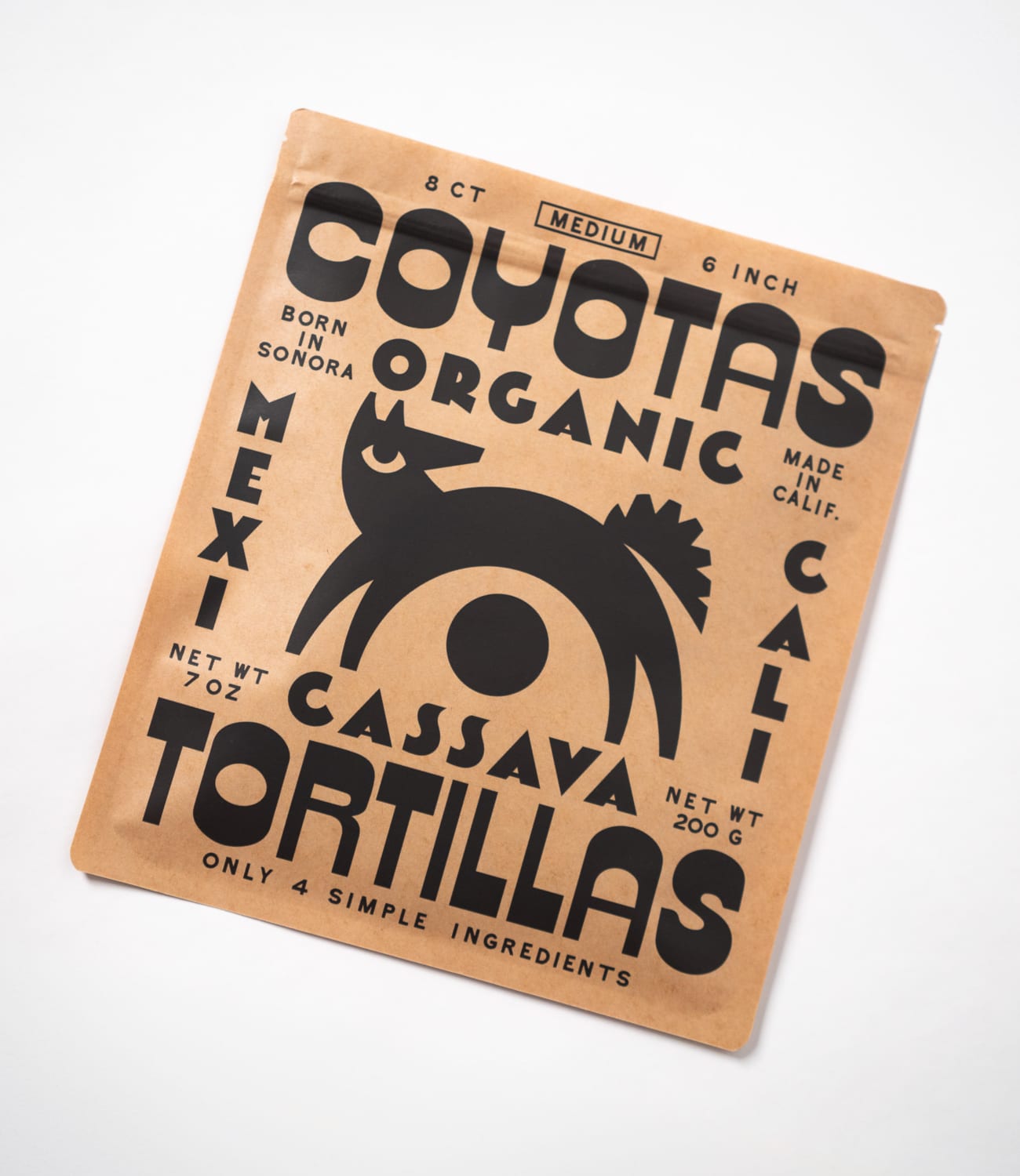 Kraft paper Coyotas organic cassava tortilla pack with a black coyote illustration