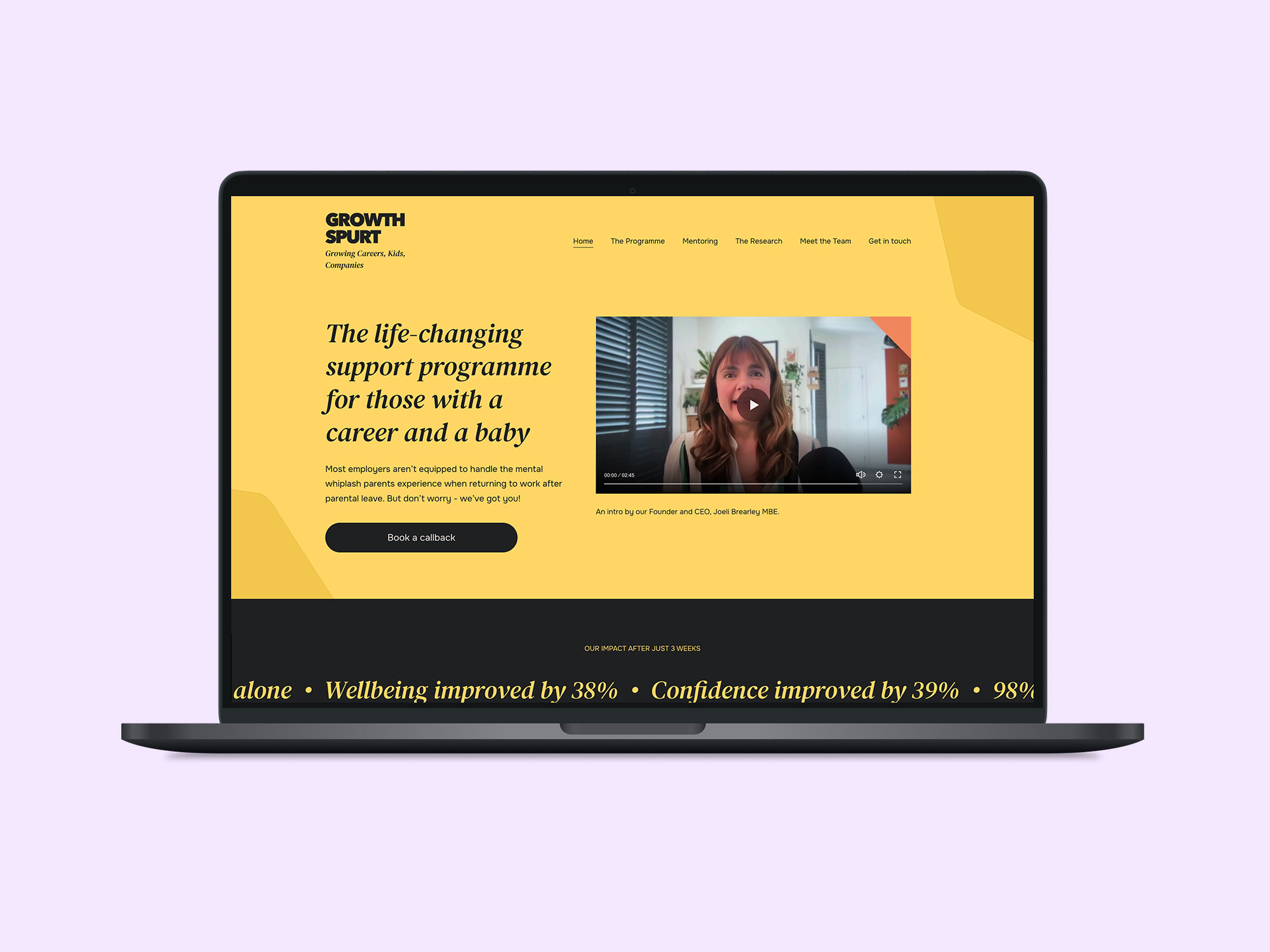 Laptop screen showing a website homepage with a yellow and black theme for Growth Spurt, featuring a headline about a life-changing support programme for working parents, a video thumbnail of a woman with brown hair, a button labeled 'Book a callback,' and a scrolling banner highlighting wellbeing and confidence improvements.