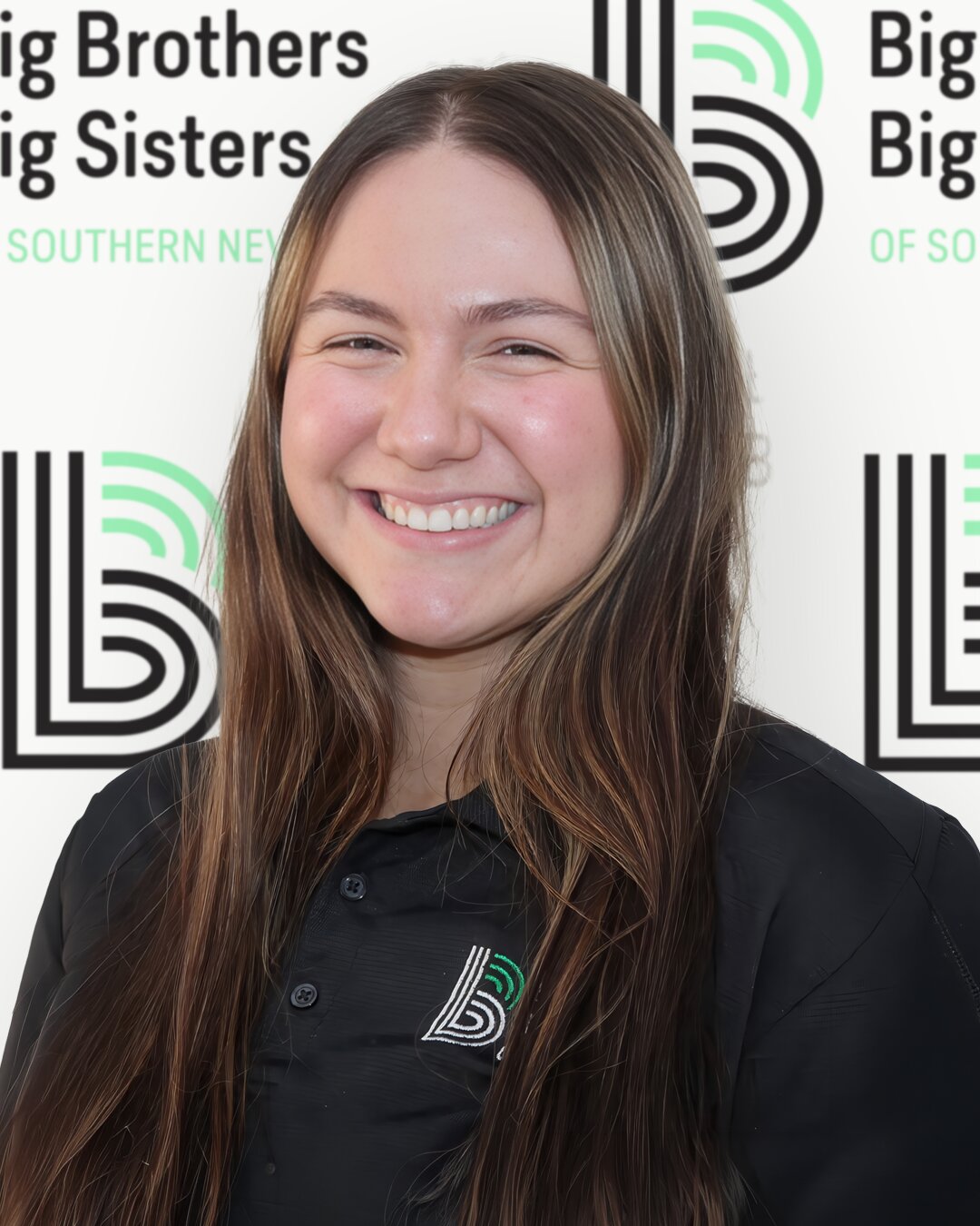 Parker Buddy, Match Support Specialist, smiling while wearing a black shirt