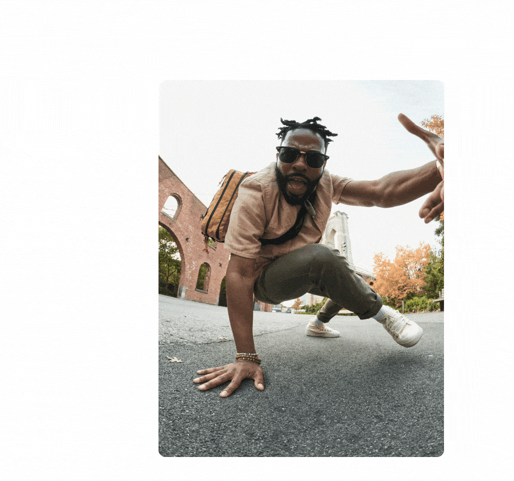 Members Mobile brand photography of a dancer mid-move on a city street