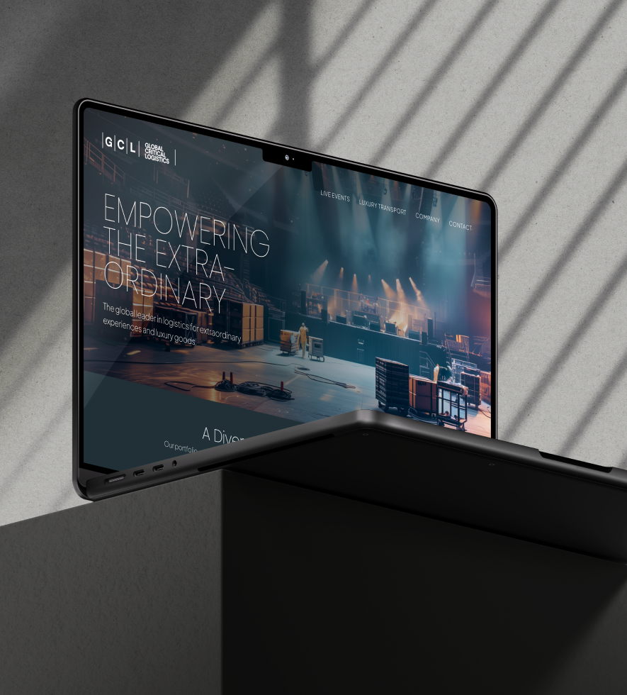 Global Critical Logistics website on a laptop: "Empowering the extraordinary"