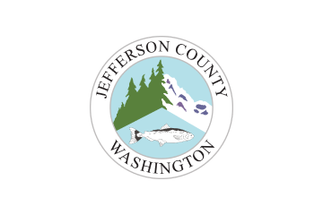 Seal of Jefferson County Washington featuring green pine trees, blue mountains, and a fish against a light blue background.