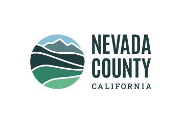 Nevada County California logo with stylized landscape of hills and mountains inside a circle.