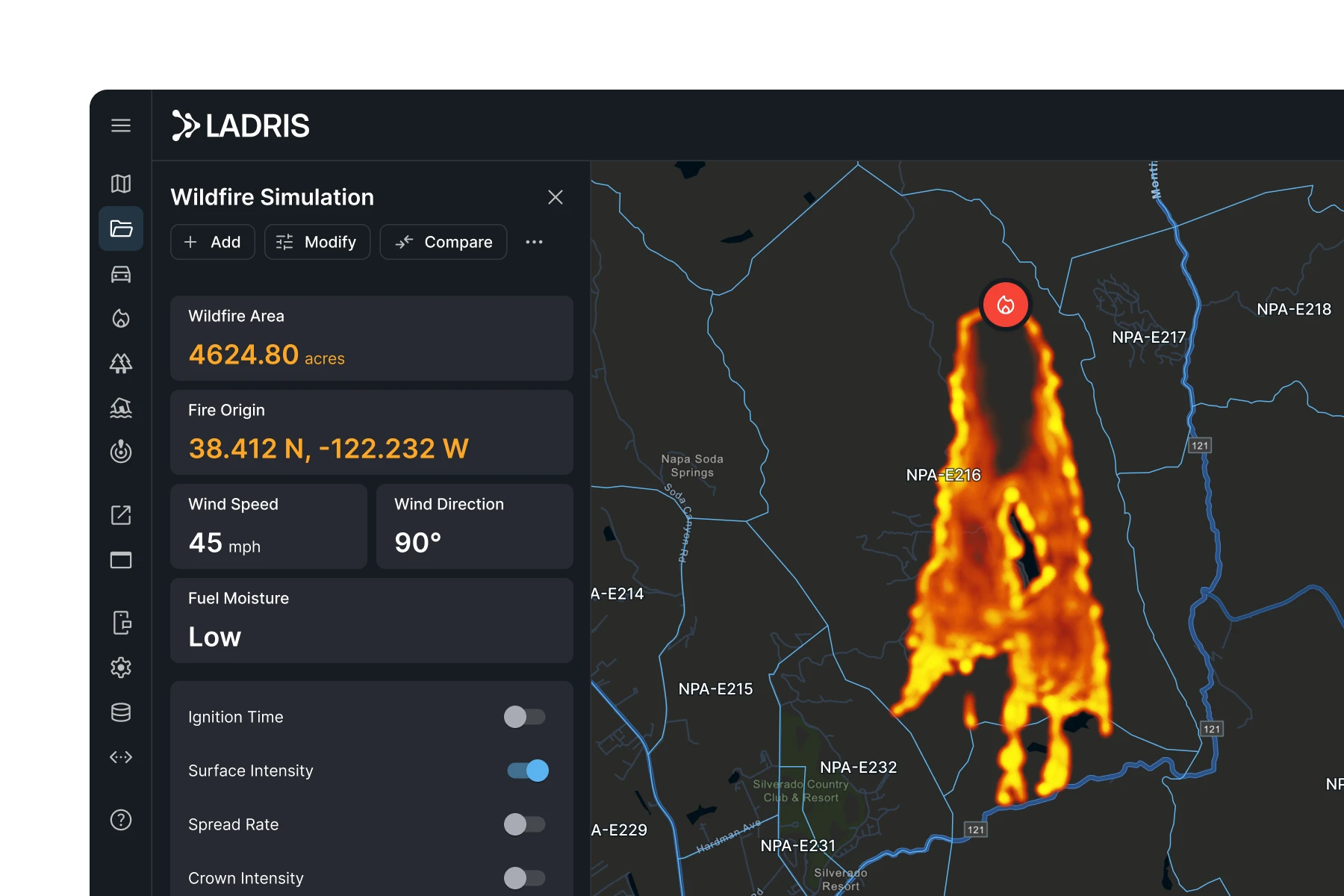 Wildfire simulation map showing a fire spreading in flames from the origin point with data on wildfire area, origin coordinates, wind speed, wind direction, and fuel moisture.
