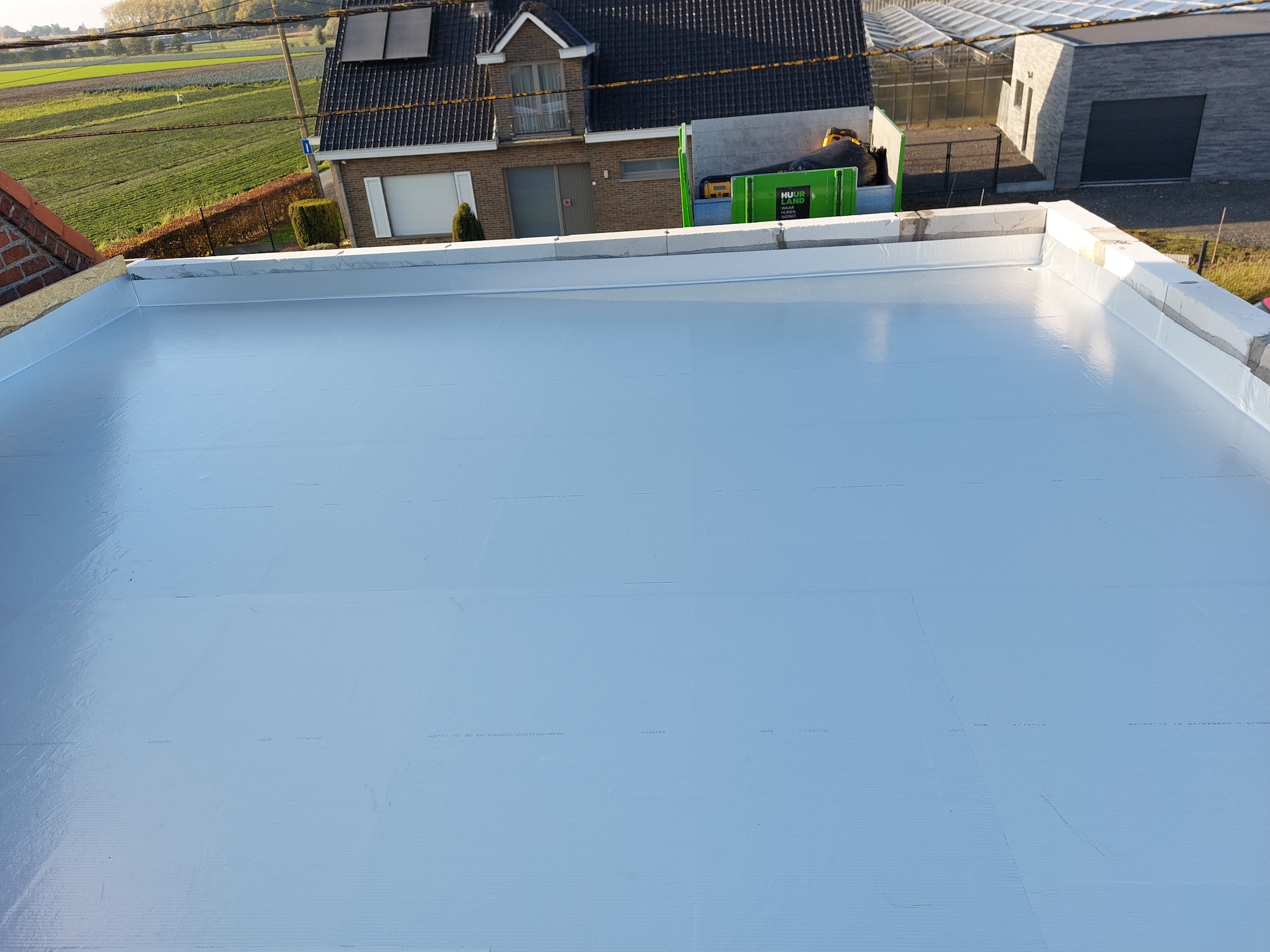 Zonnebeke: Platte daken EPDM + Hellend dak